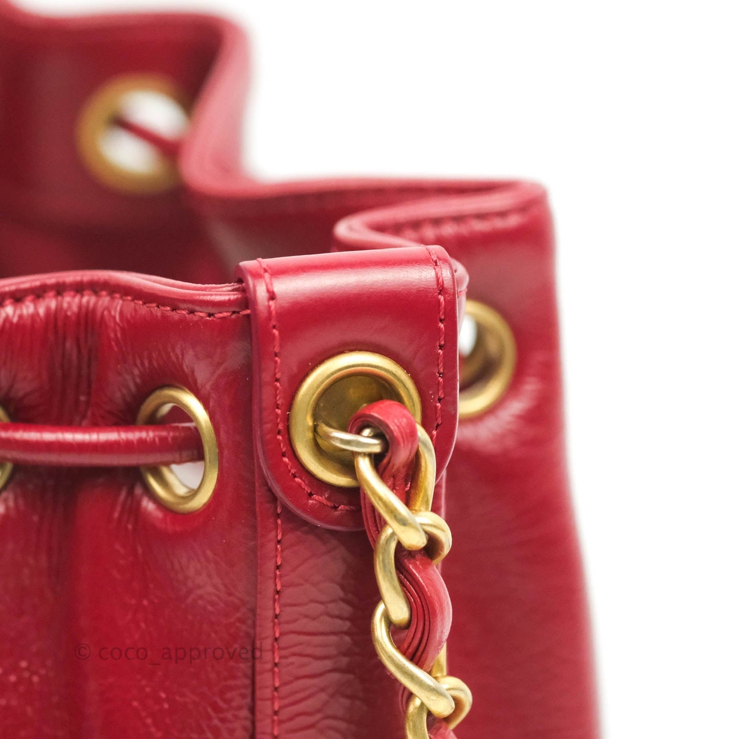 Chanel Shiny Aged Calfskin CC Chain Mini Drawstring Bag Red