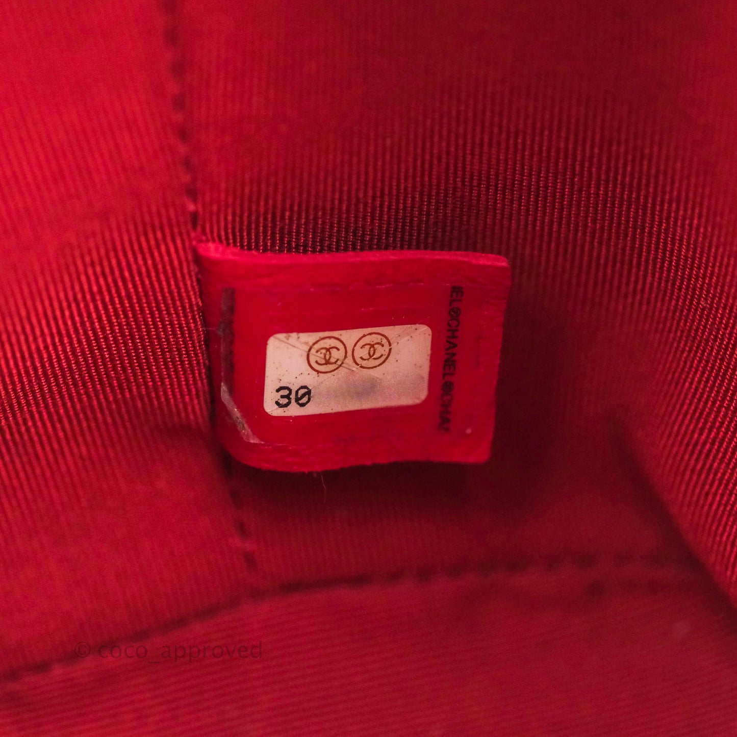 Chanel Shiny Aged Calfskin CC Chain Mini Drawstring Bag Red