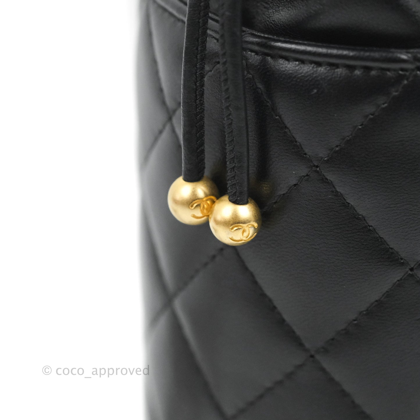 Chanel Quilted Drawstring Pearl Flower Bucket Bag Black Lambskin Aged Gold Hardware