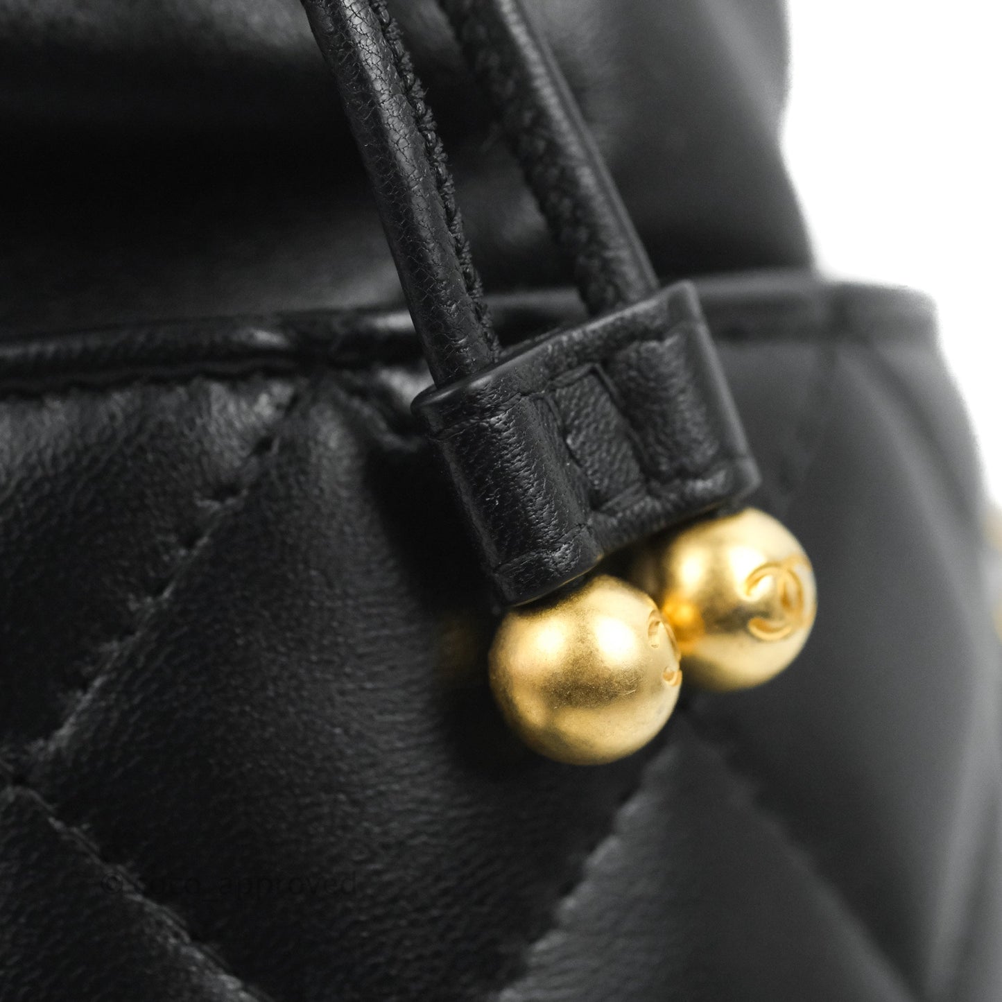 Chanel Quilted Drawstring Pearl Flower Bucket Bag Black Lambskin Aged Gold Hardware