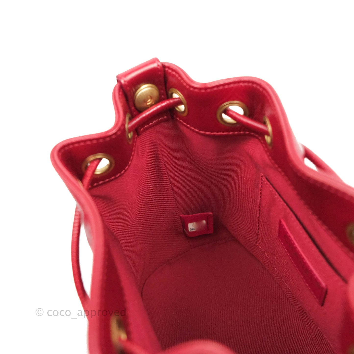 Chanel Shiny Aged Calfskin CC Chain Mini Drawstring Bag Red