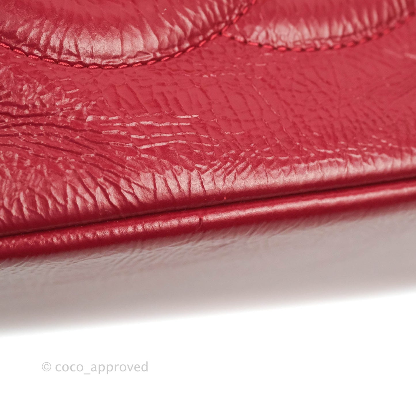 Chanel Shiny Aged Calfskin CC Chain Mini Drawstring Bag Red