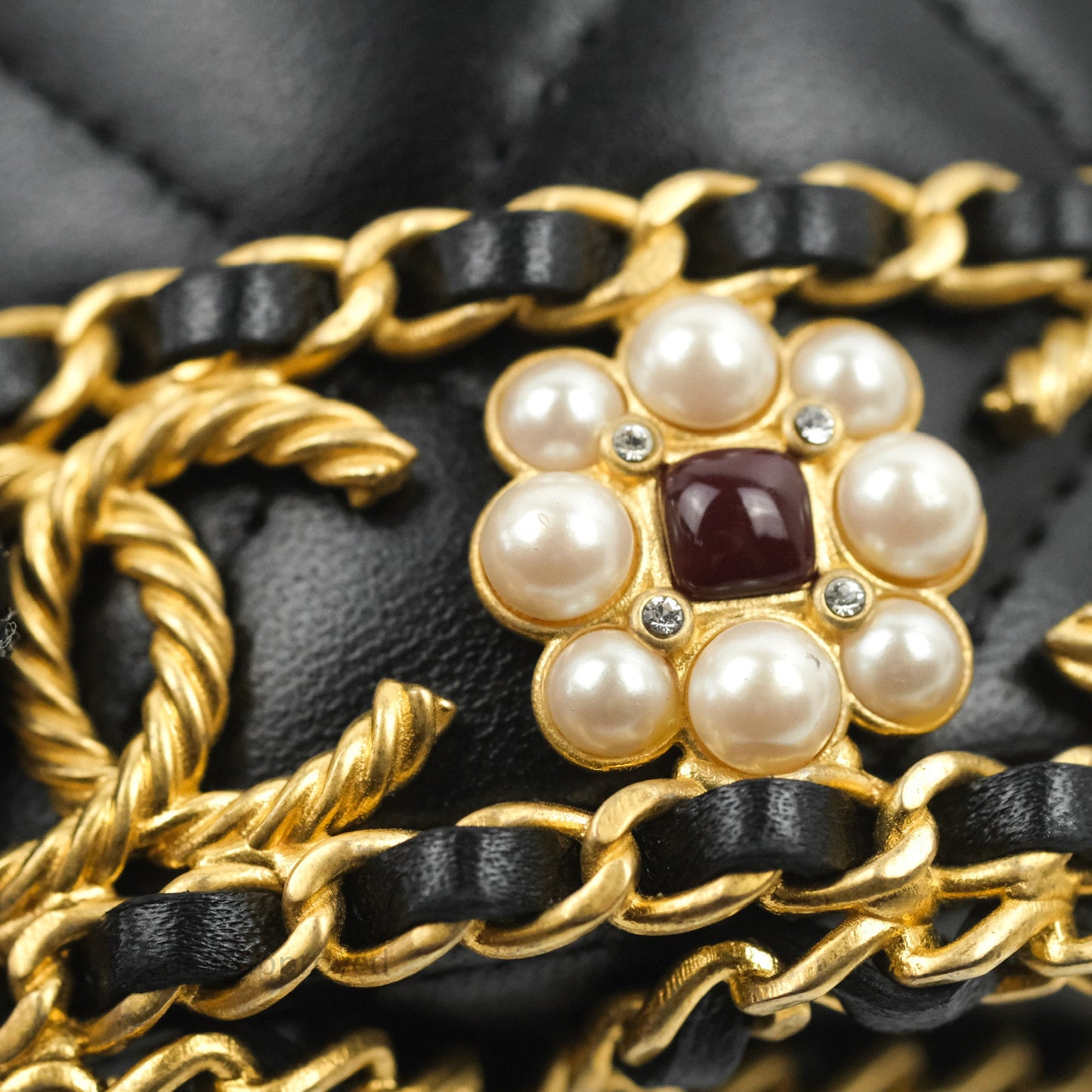 Chanel Quilted Drawstring Pearl Flower Bucket Bag Black Lambskin Aged Gold Hardware