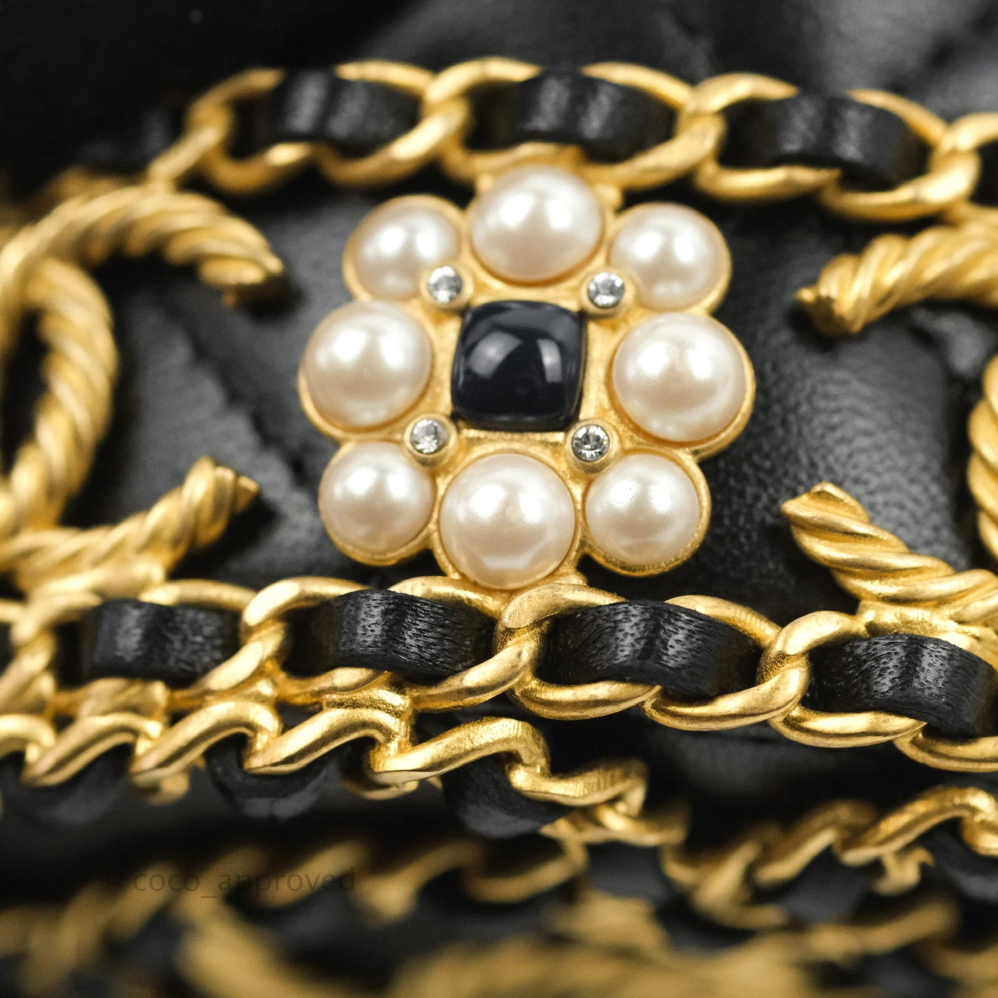 Chanel Quilted Drawstring Pearl Flower Bucket Bag Black Lambskin Aged Gold Hardware