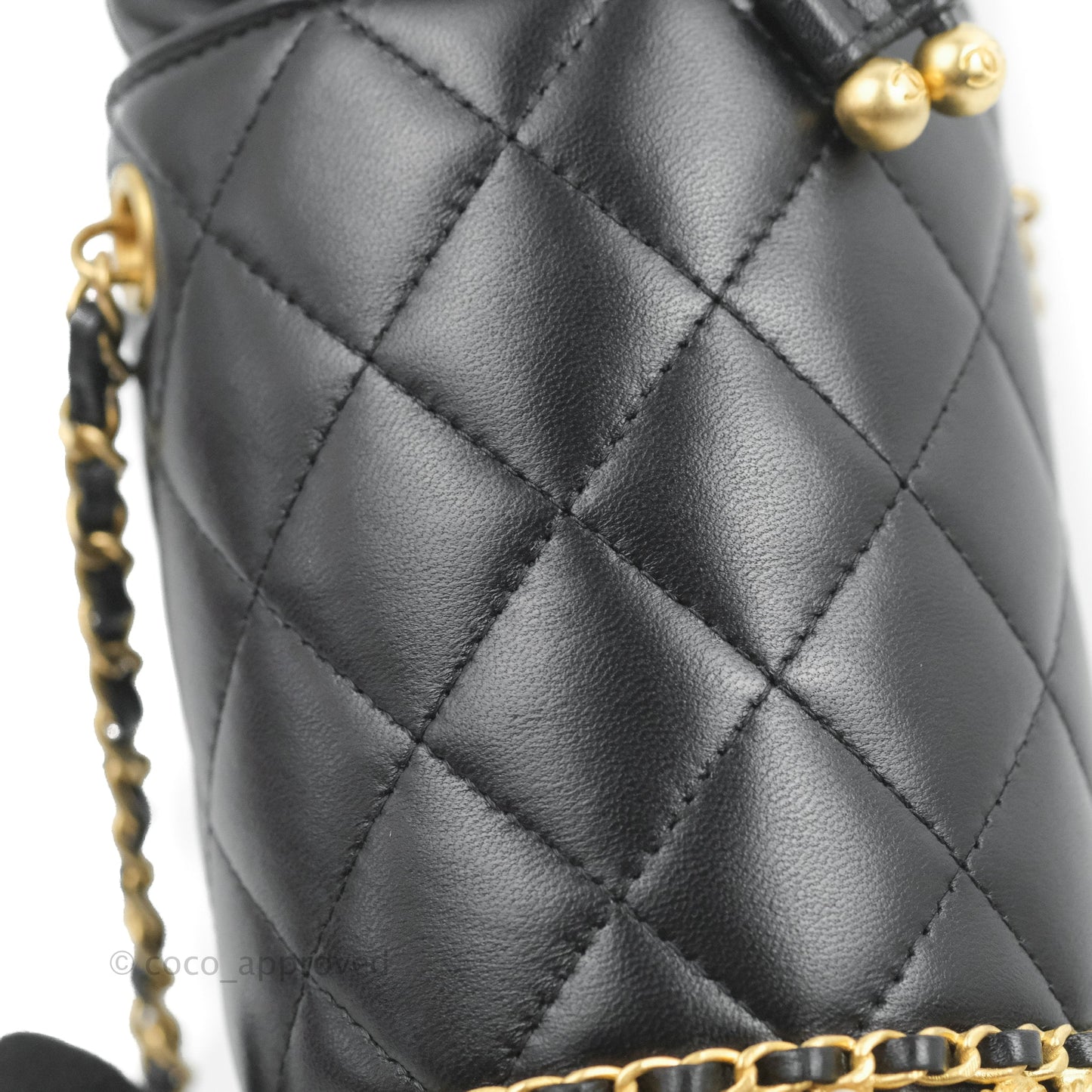 Chanel Quilted Drawstring Pearl Flower Bucket Bag Black Lambskin Aged Gold Hardware