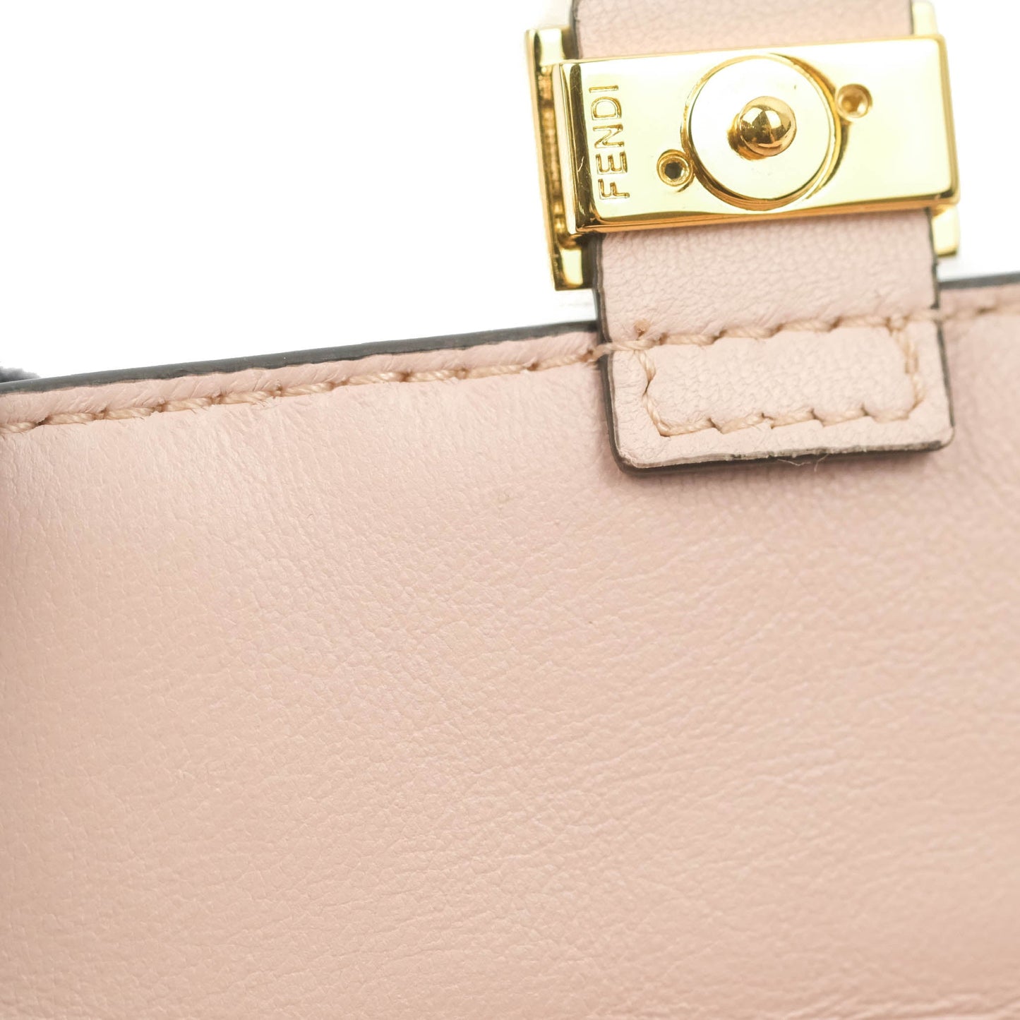 Fendi Nappa FF Embossed Nano Baguette Charm Beige Pink