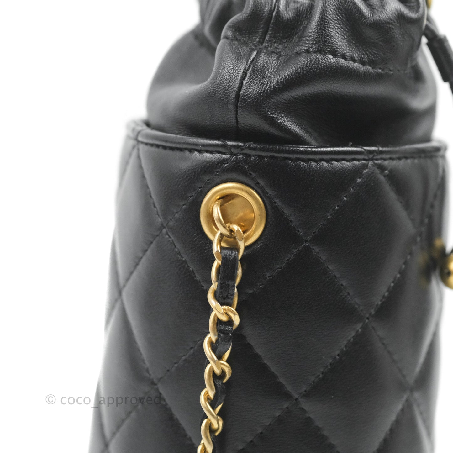 Chanel Quilted Drawstring Pearl Flower Bucket Bag Black Lambskin Aged Gold Hardware