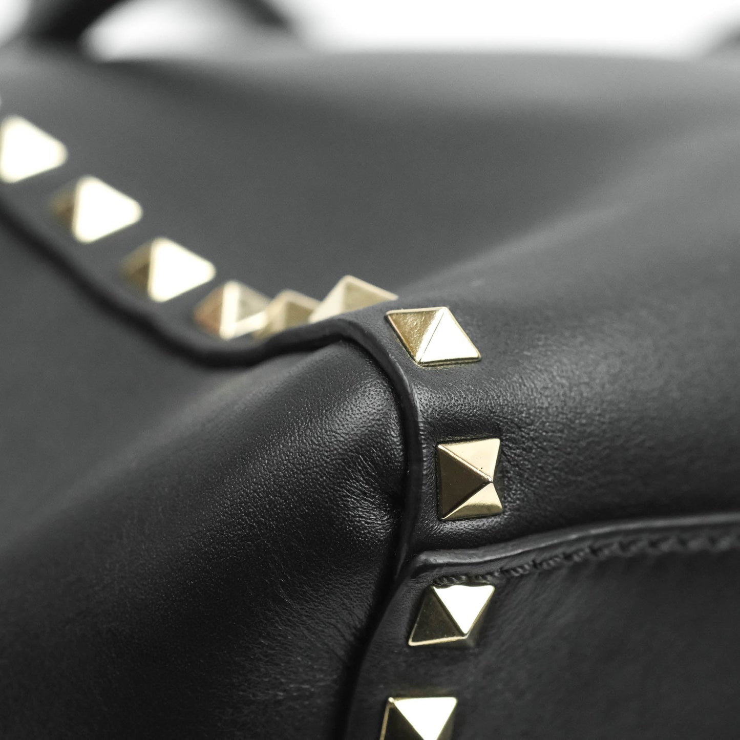 Valentino Garavani Rockstud Mini Trapeze Shoulder Bag Black Calfskin Gold Hardware