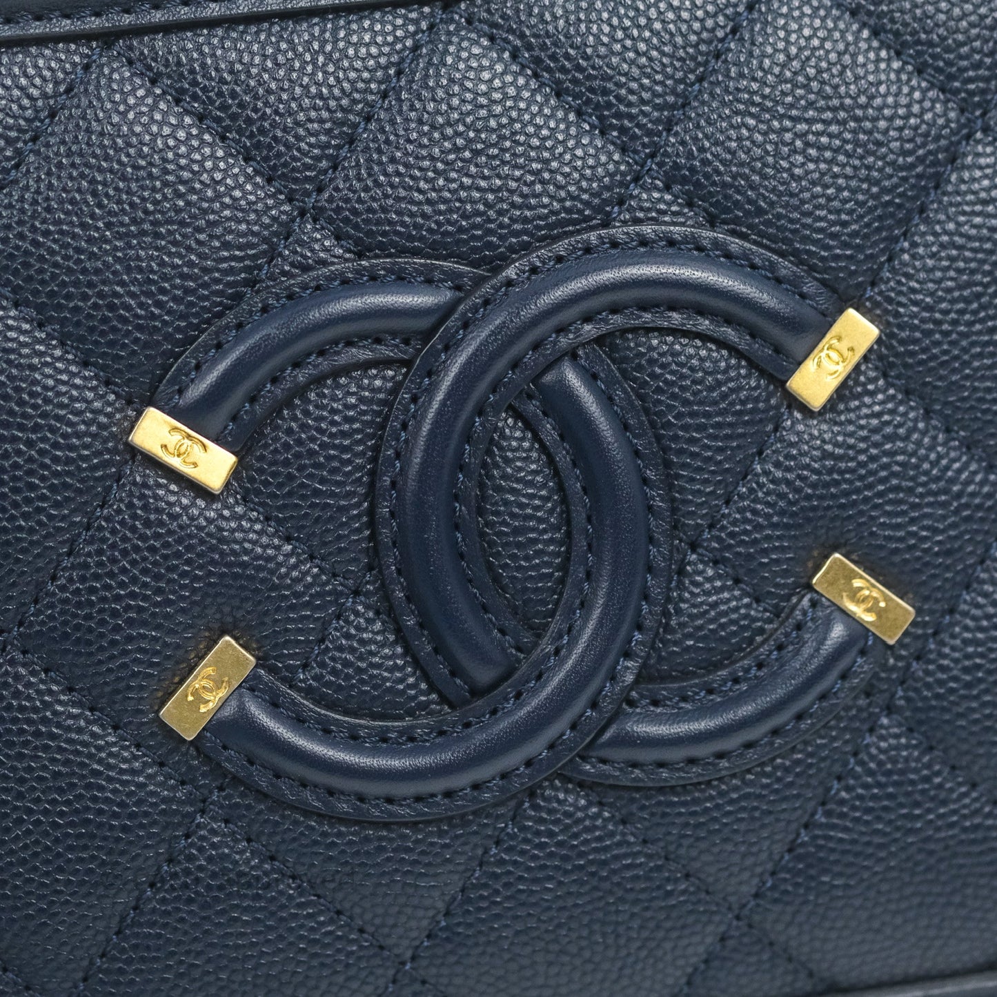 Chanel Quilted Small CC Filigree Vanity Case Navy Caviar Gold Hardware