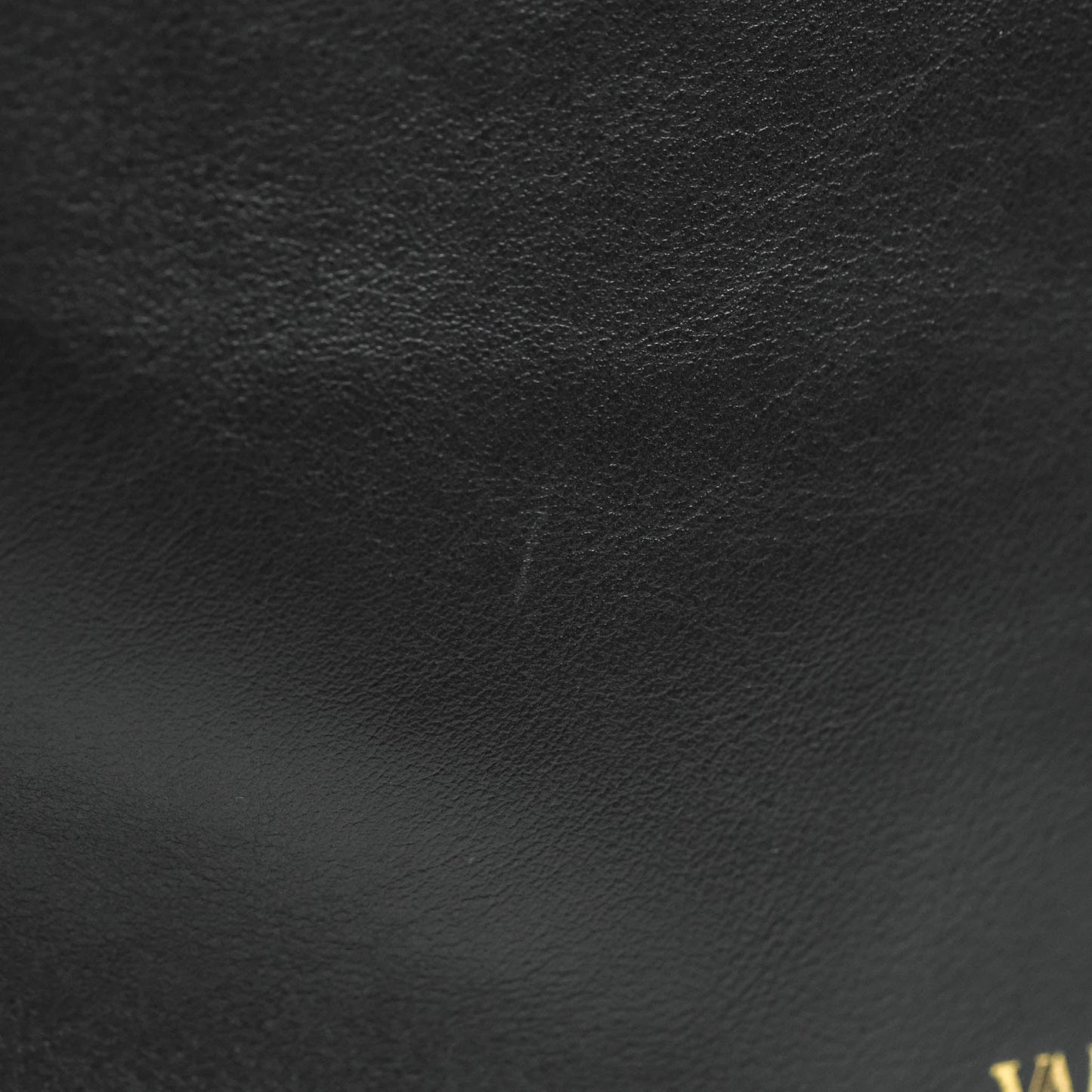Valentino Garavani Rockstud Mini Trapeze Shoulder Bag Black Calfskin Gold Hardware
