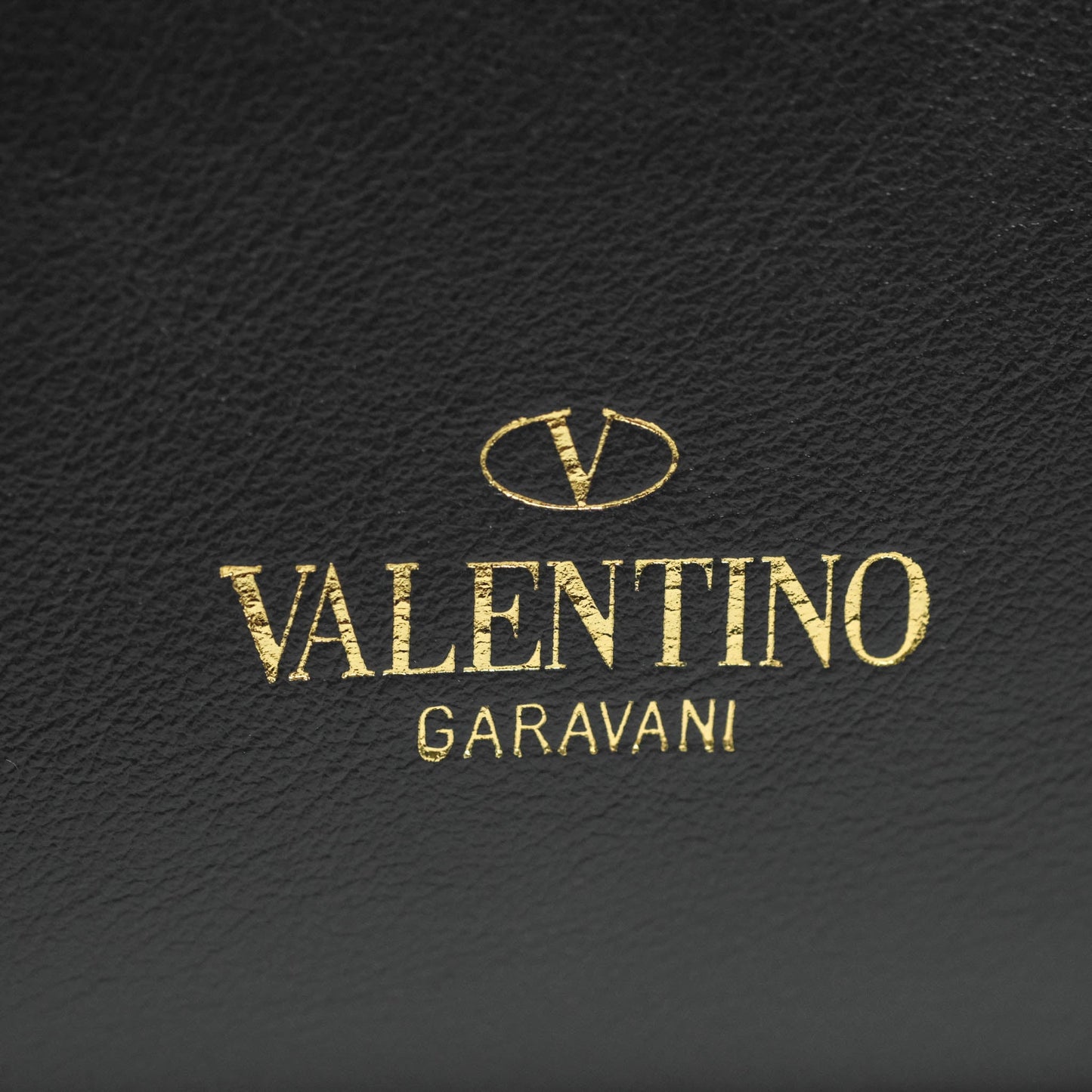 Valentino Garavani Rockstud Mini Trapeze Shoulder Bag Black Calfskin Gold Hardware