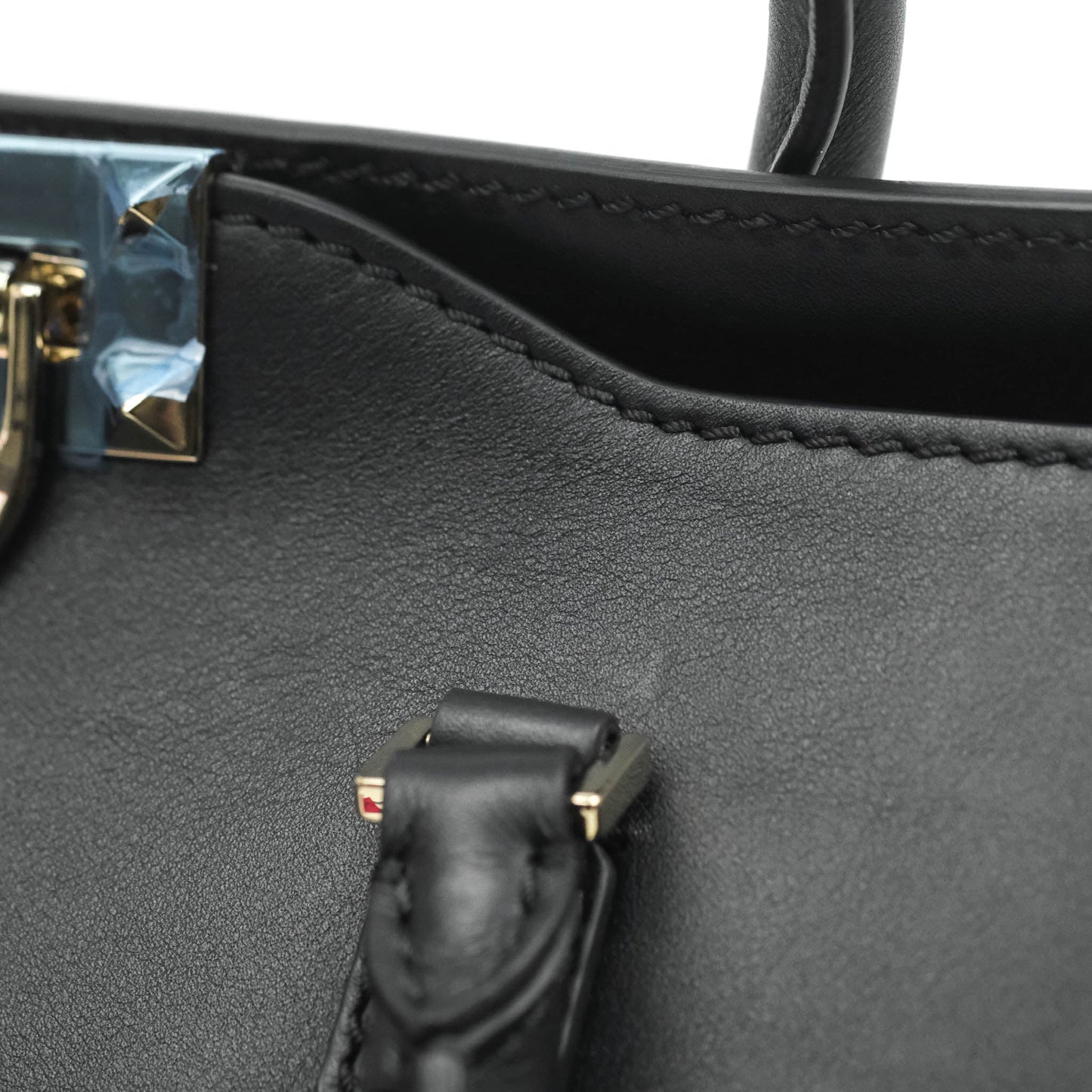 Valentino Garavani Rockstud Mini Trapeze Shoulder Bag Black Calfskin Gold Hardware