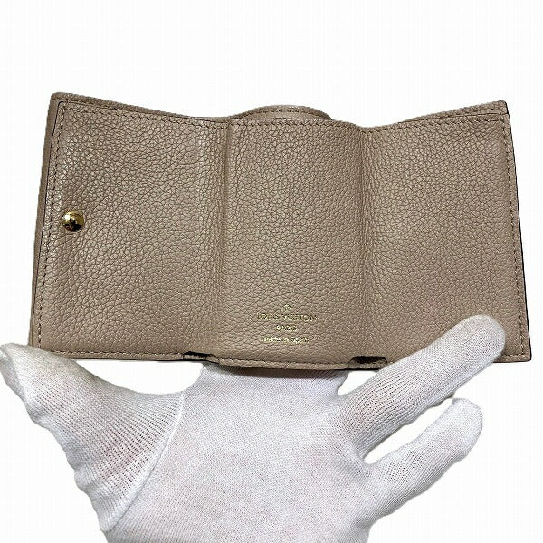 Louis Vuitton Leather Portefeuille Lock Mini Wallet