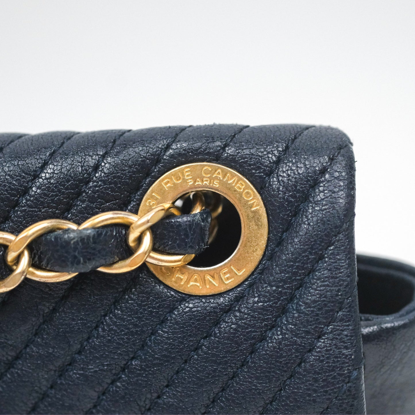 Chanel Small Chevron Surpique Flap Navy Calfskin Aged Gold Hardware