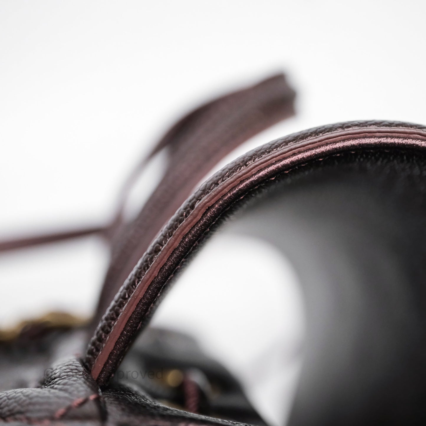 Chanel Quilted Filigree Backpack Iridescent Burgundy Caviar Aged Gold Hardware