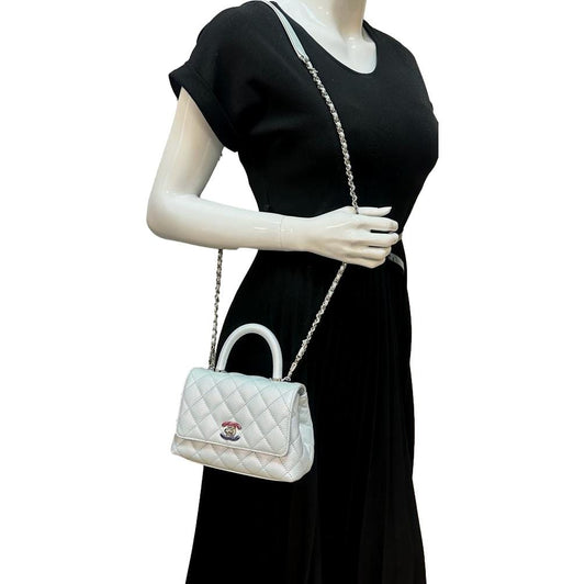 Luxury Chanel Coco Extra Mini Top Handle Iridescent Caviar Leather Crossbody Bag Light Blue