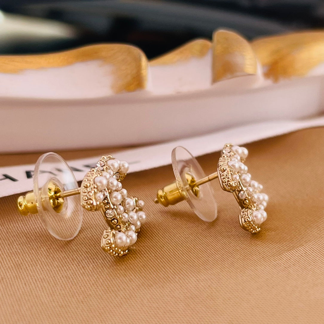 Luxury Chanel DOUBLE C MOP GOLD STUD EARRINGS