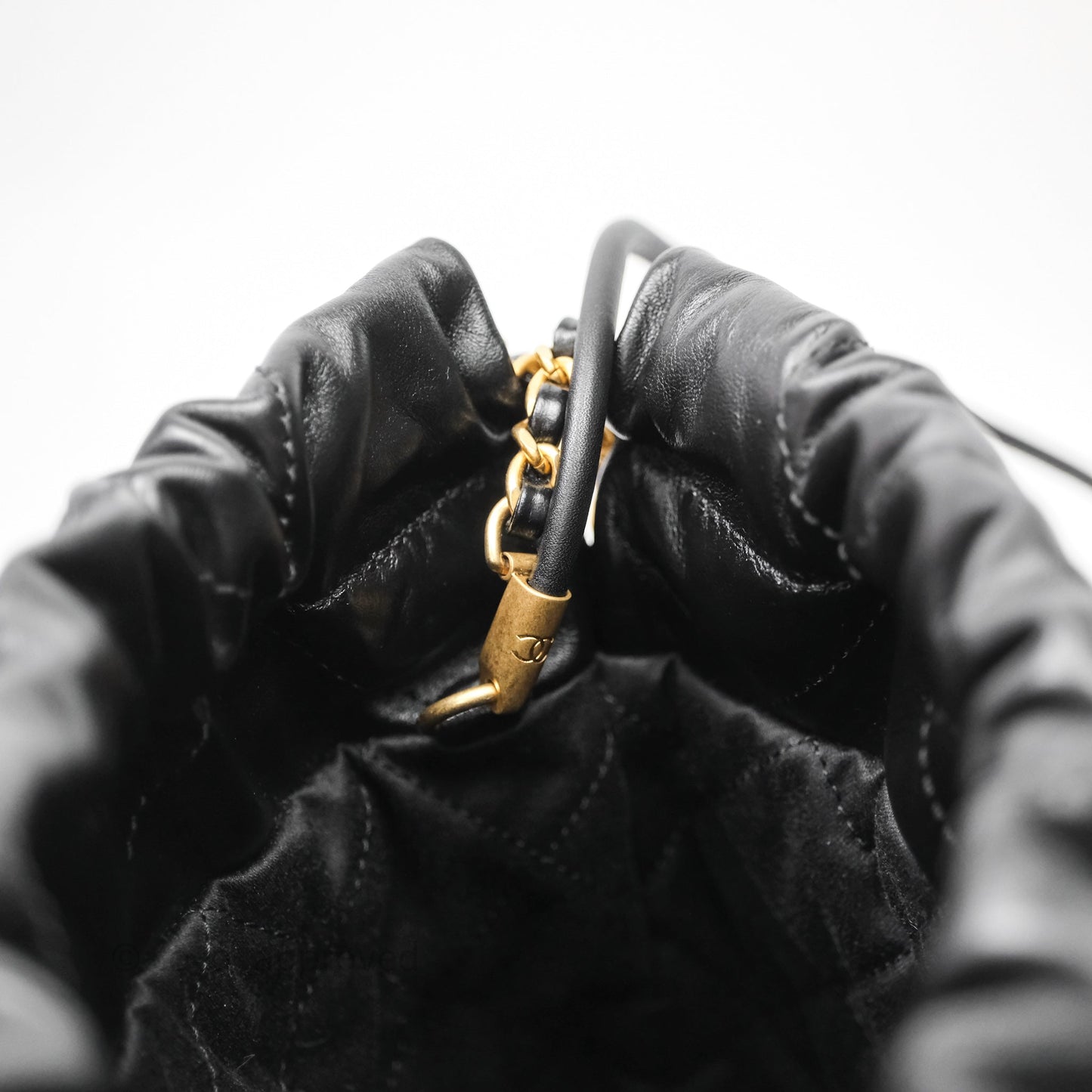 Chanel 22 Mini Bag Black Shiny Crumpled Calfskin Aged Gold Hardware