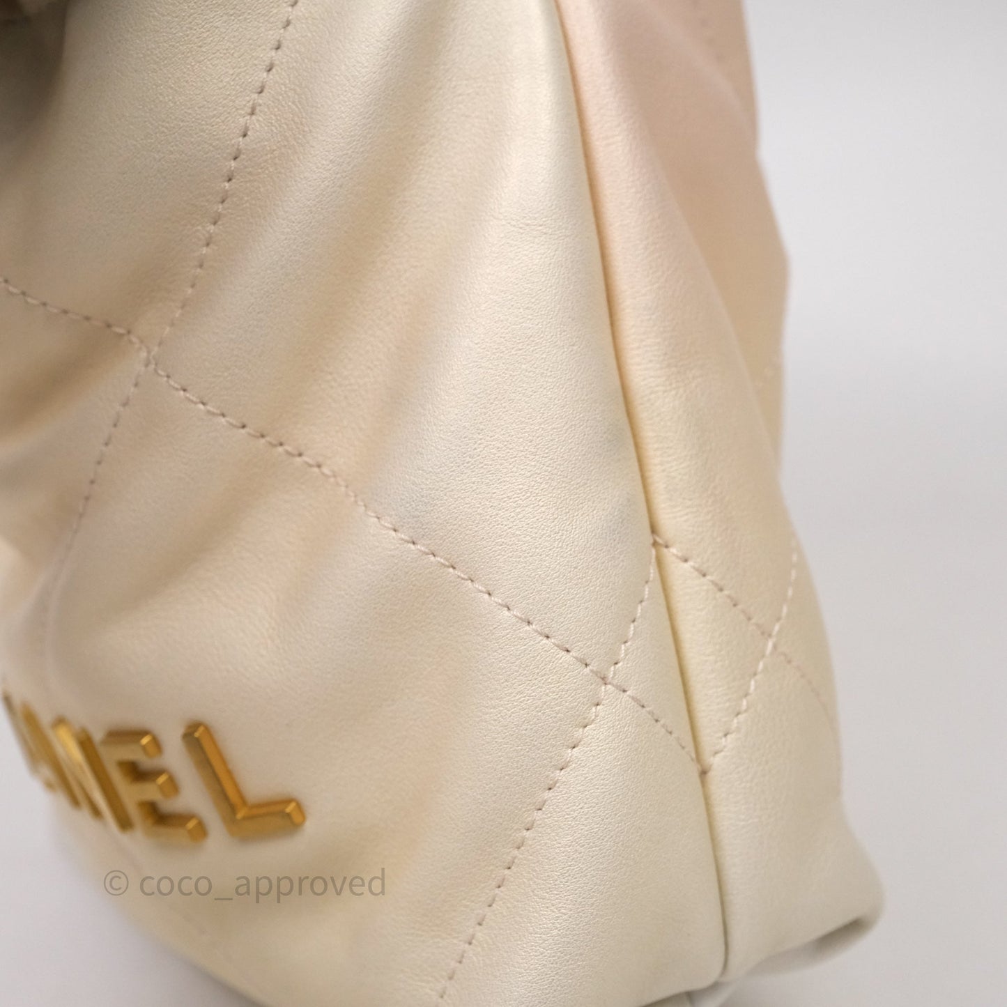Chanel 22 Mini Bag Iridescent Light Pearly Calfskin Aged Gold Hardware