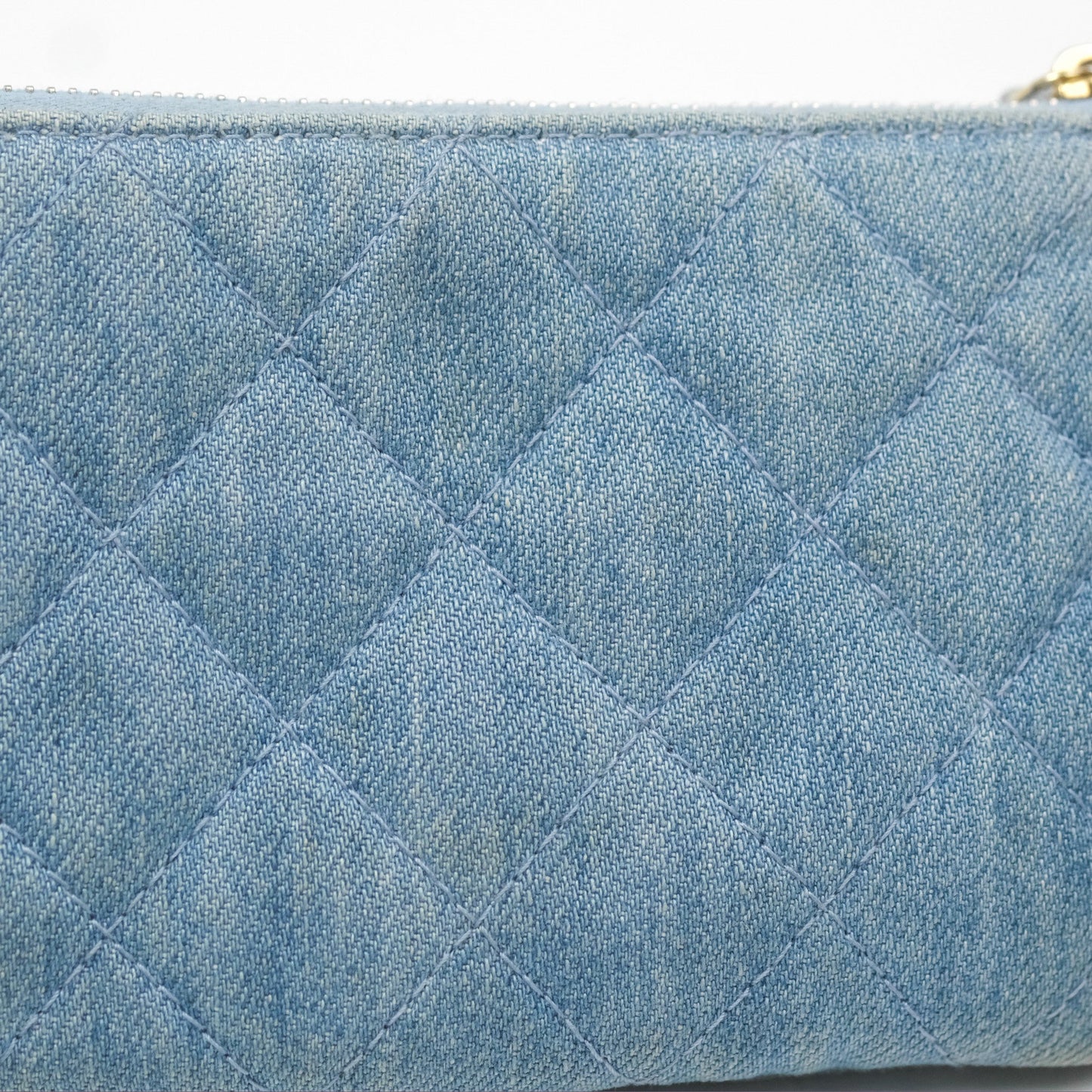 Chanel Mini Reissue O Case Quilted Light Blue Denim Aged Gold Hardware