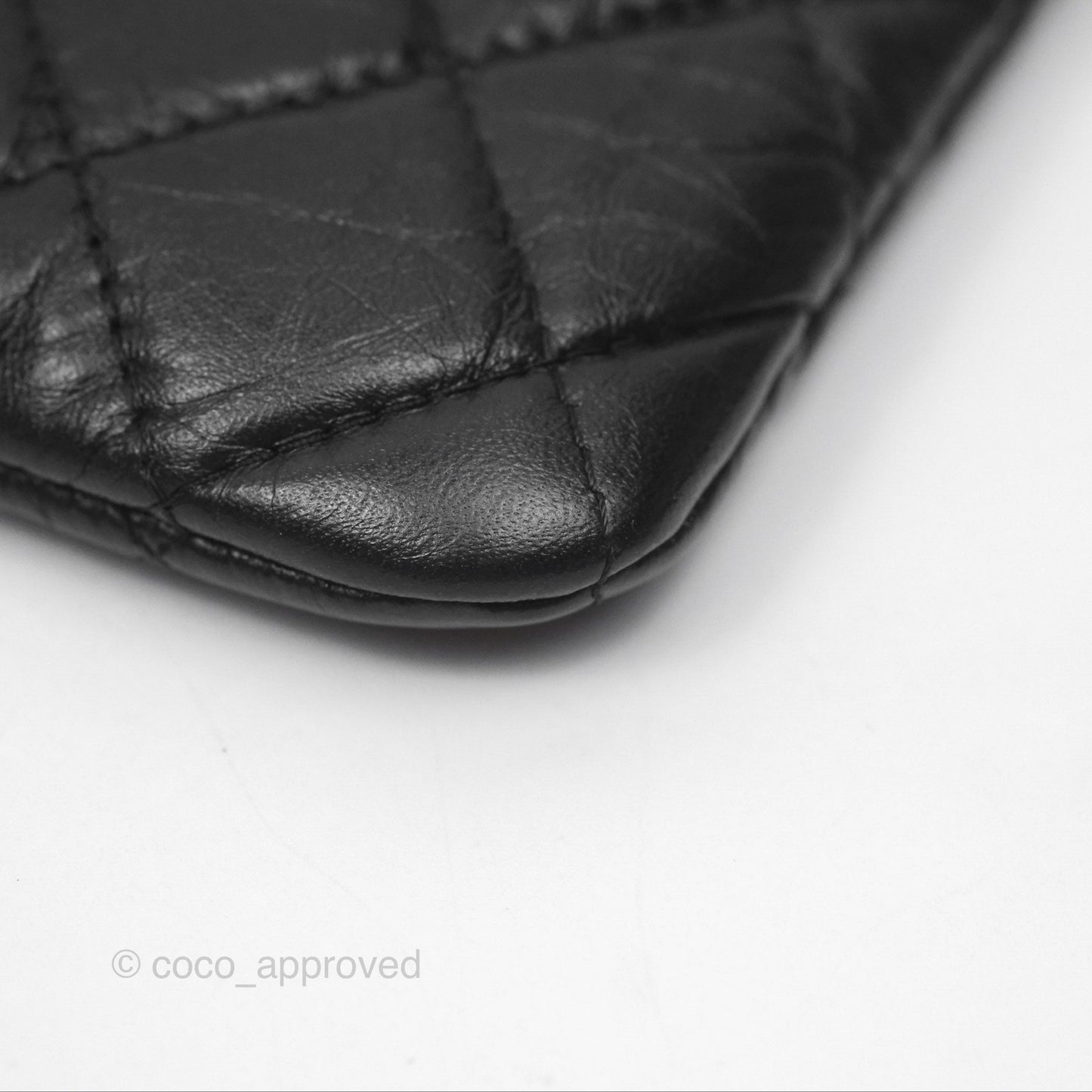 Chanel Quilted Mini Reissue O Case Black Calfskin Aged Gold Hardware