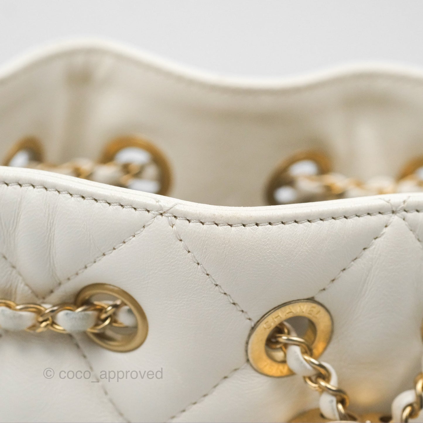 Chanel Quilted Drawstring Bucket Bag Ivory Lambskin Aged Gold Hardware