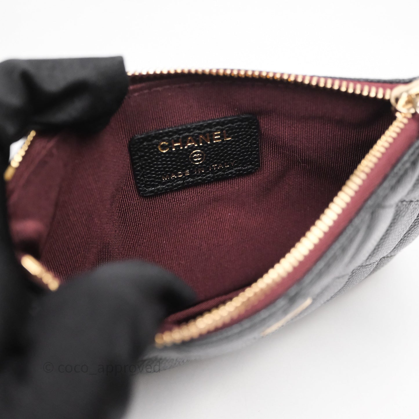 Chanel Quilted Mini O case Black Caviar Gold Hardware