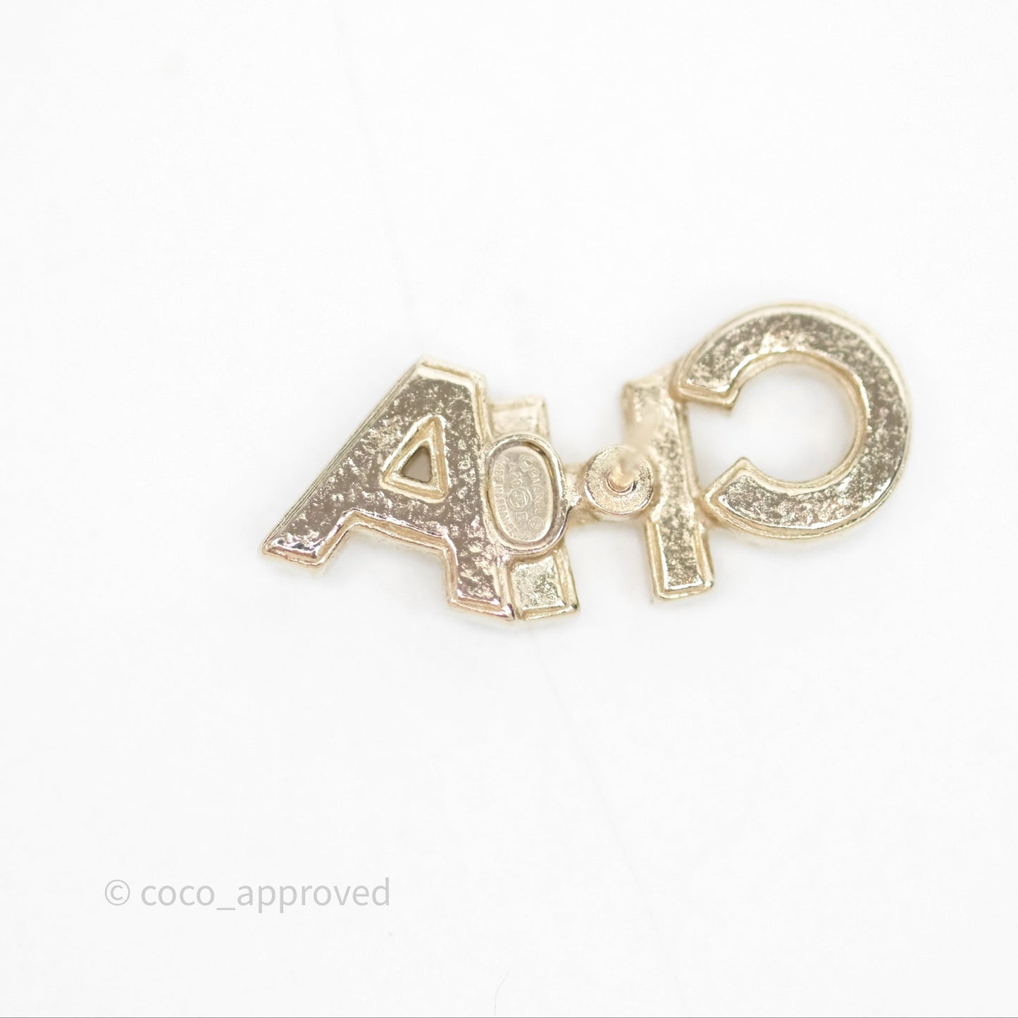 Chanel Logo CHA-NEL Crystal Earrings Gold Tone 20B