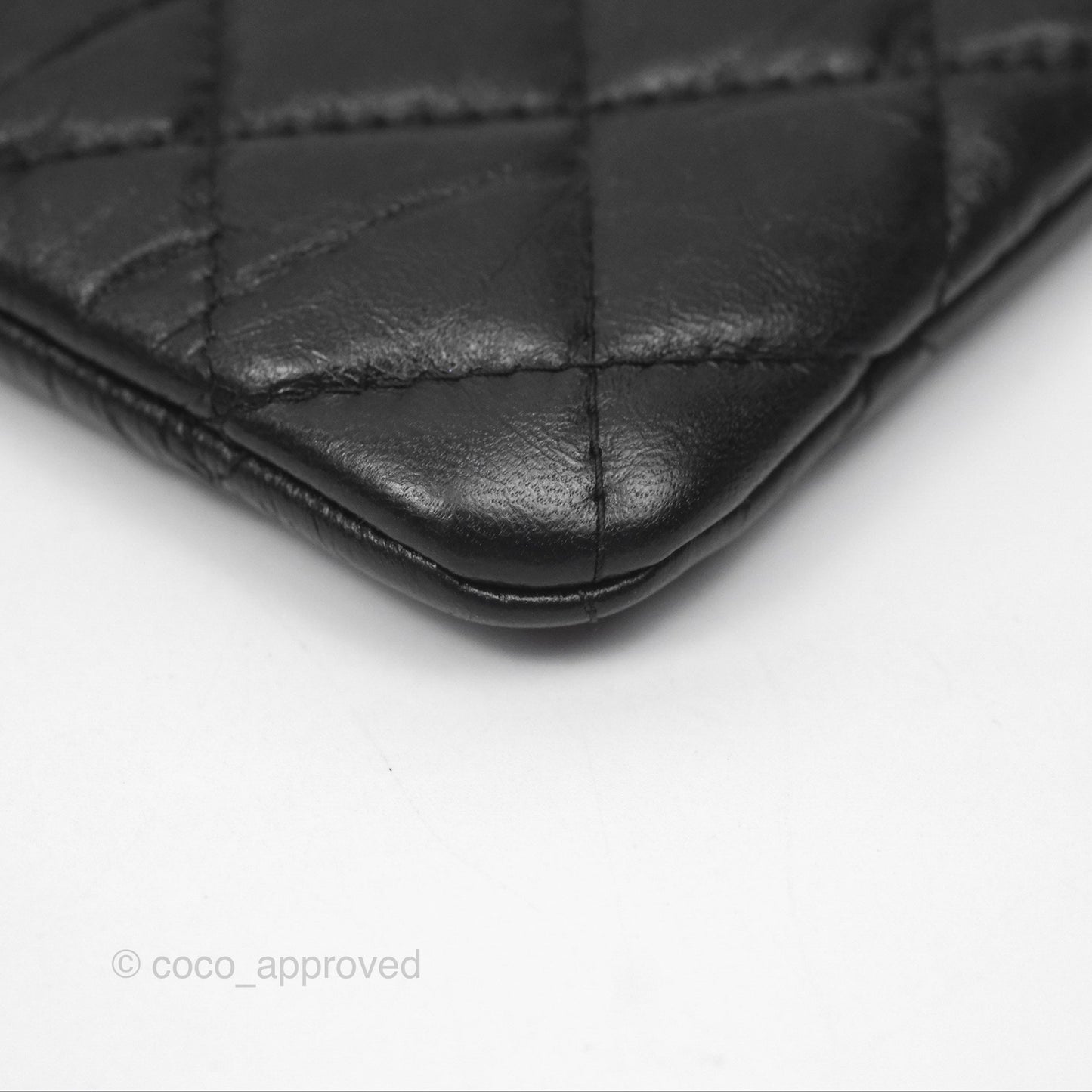 Chanel Quilted Mini Reissue O Case Black Calfskin Aged Gold Hardware