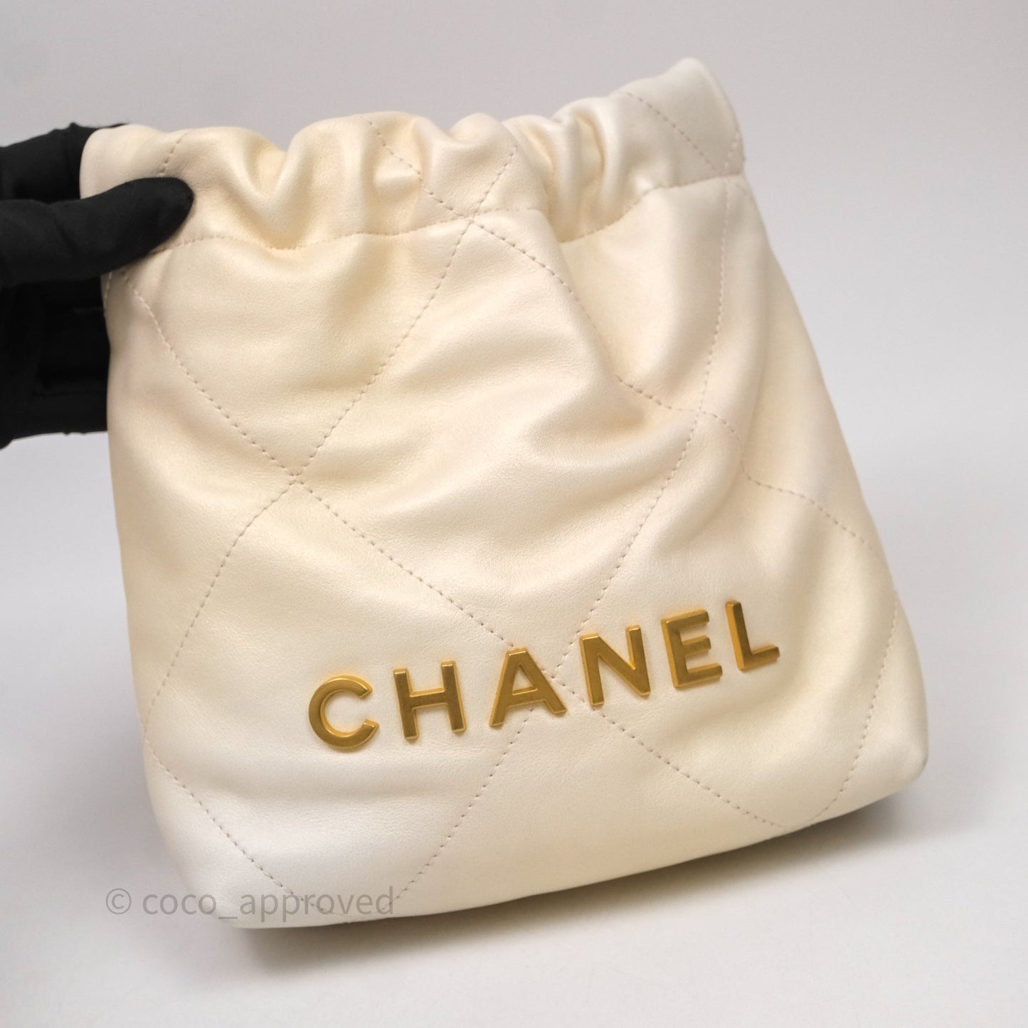 Chanel 22 Mini Bag Iridescent Light Pearly Calfskin Aged Gold Hardware