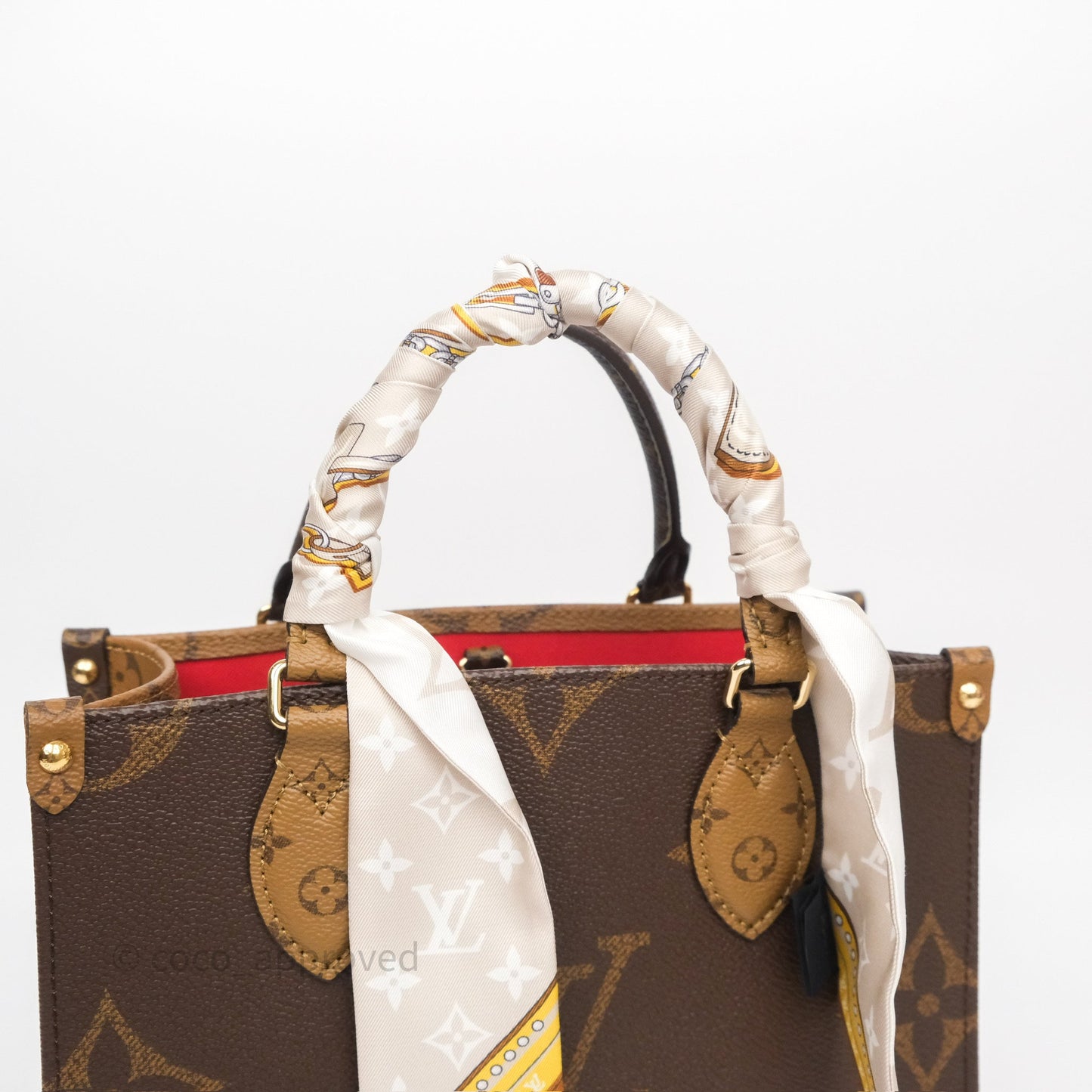 Louis Vuitton OnTheGo PM in Monogram Reverse Canvas