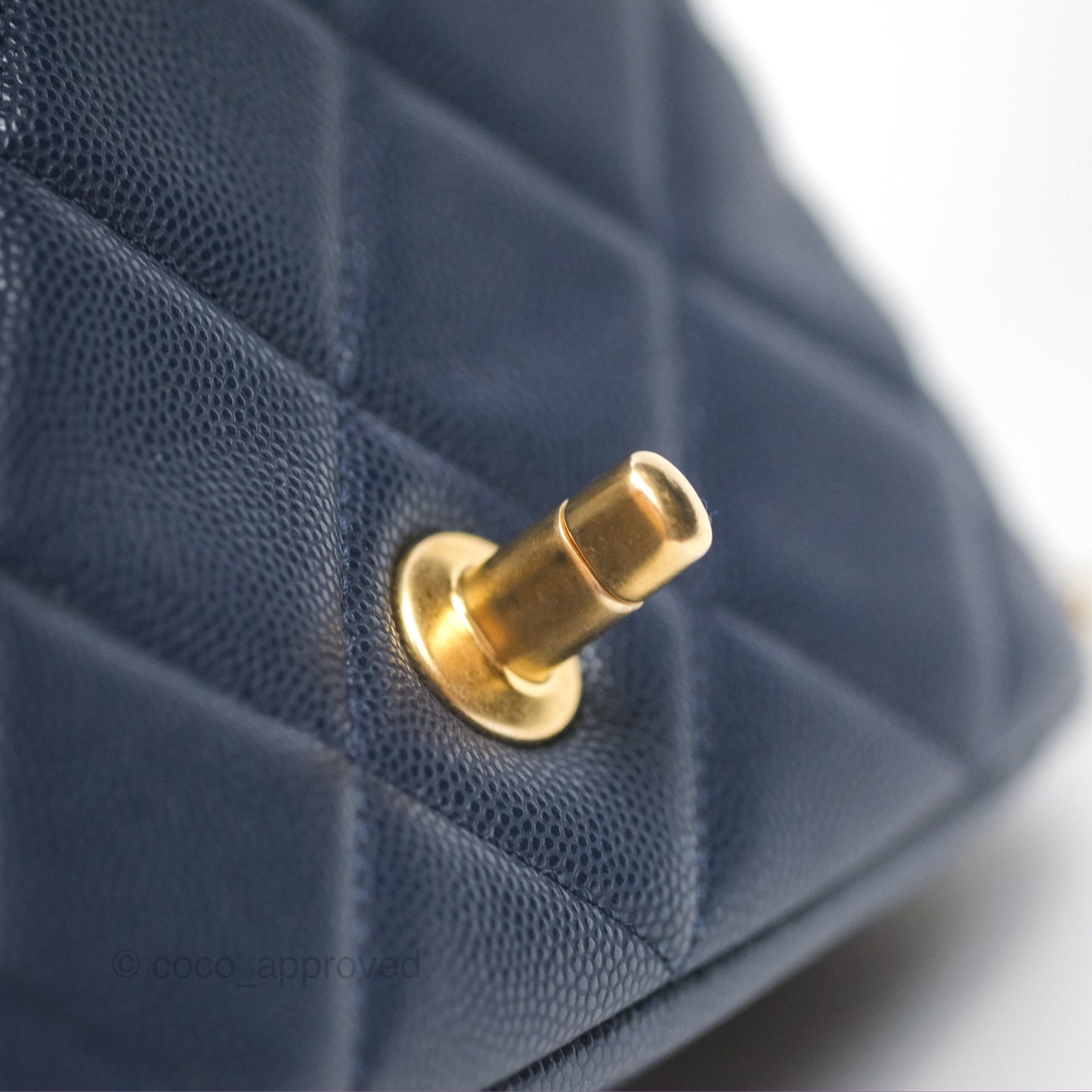 Chanel Mini Flap with Coin Charm Navy Caviar Aged Gold Hardware 22A