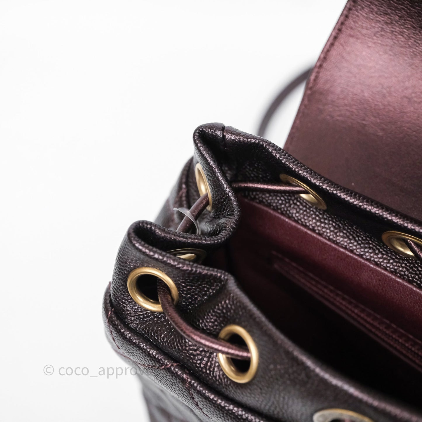 Chanel Quilted Filigree Backpack Iridescent Burgundy Caviar Aged Gold Hardware