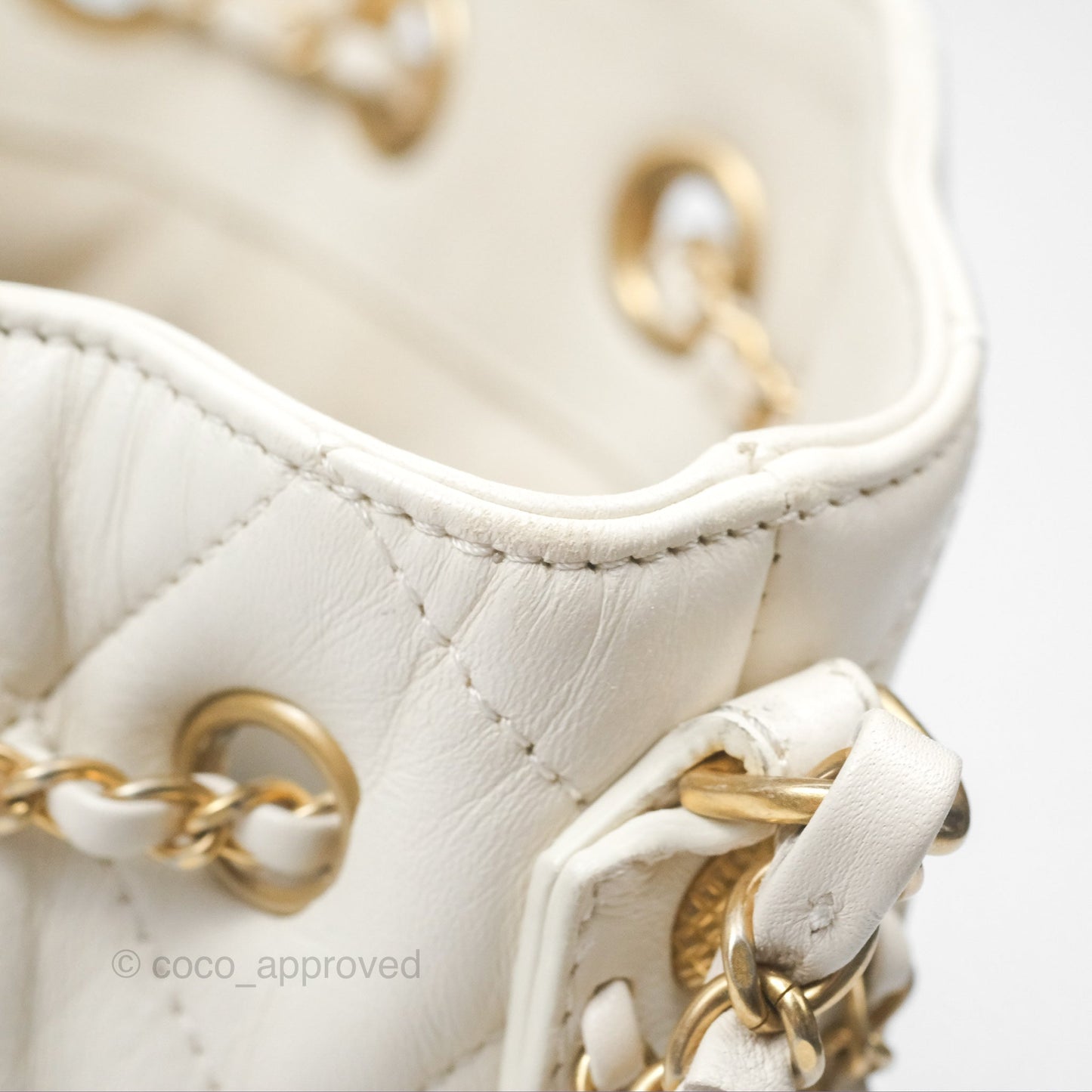 Chanel Quilted Drawstring Bucket Bag Ivory Lambskin Aged Gold Hardware
