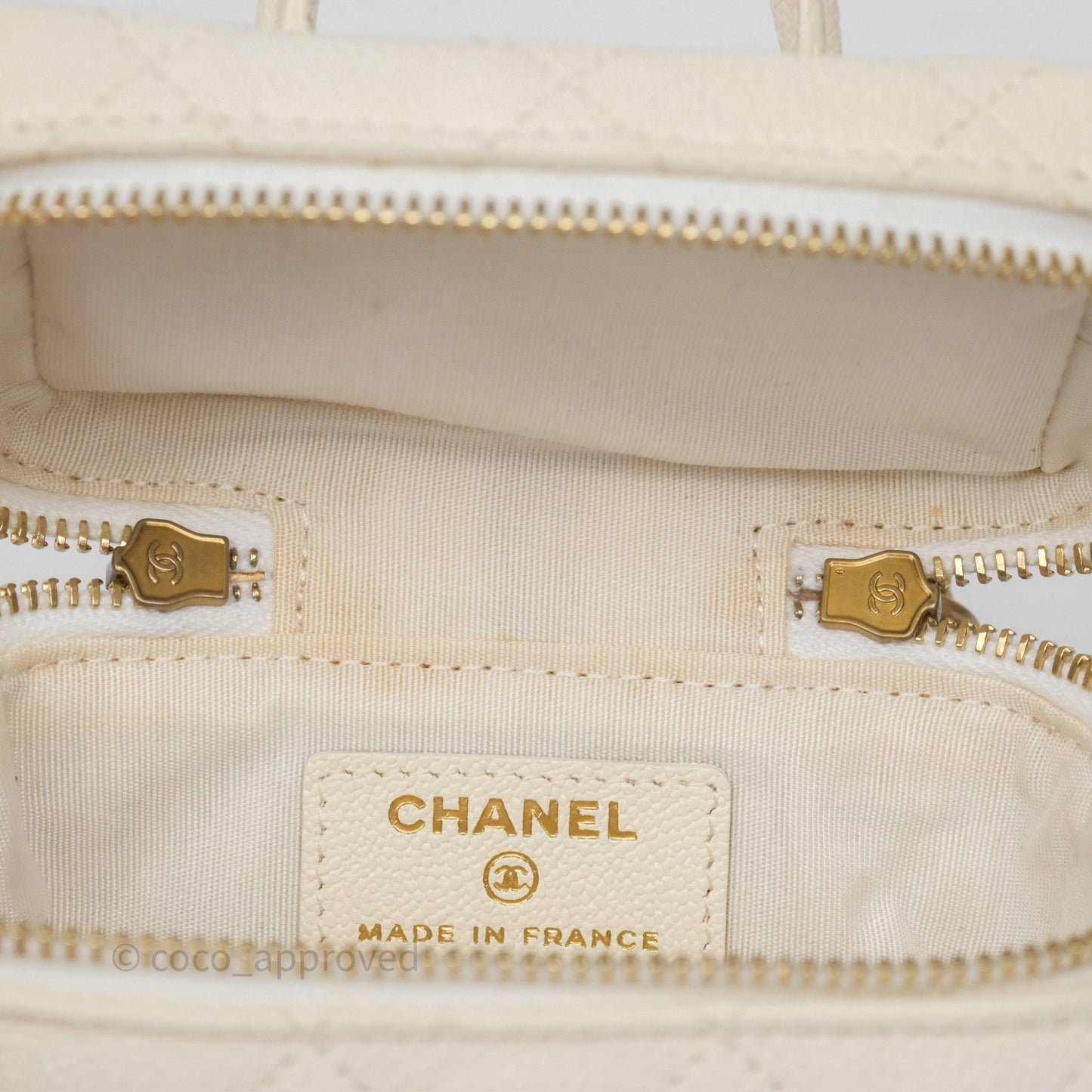 Chanel Quilted Mini Top Handle Vanity With Chain Ivory Caviar Aged Gold Hardware