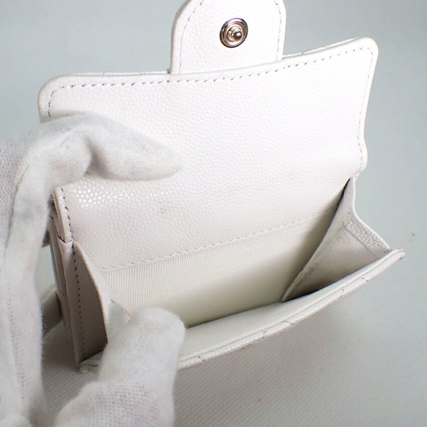 Luxury Chanel caviar skin white trifold wallet