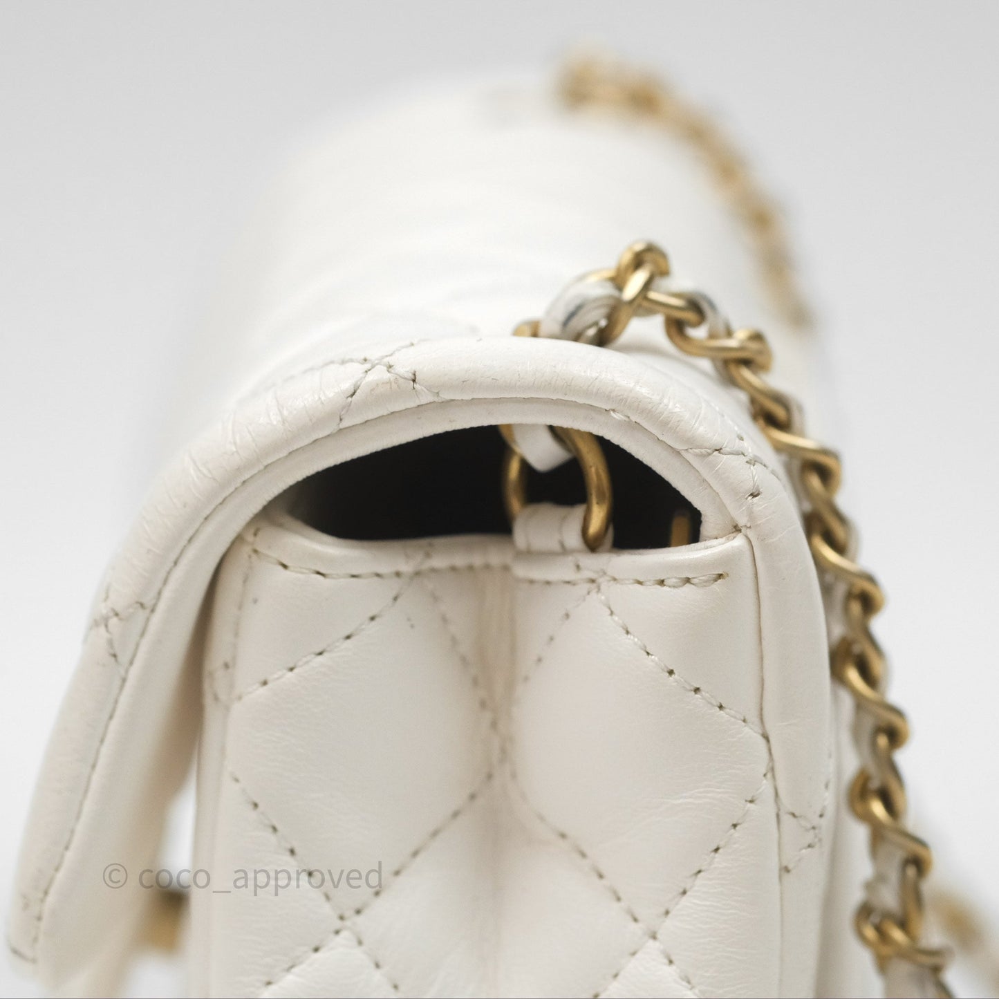 Chanel Mini Rectangular Pearl Crush Quilted White Lambskin Aged Gold Hardware