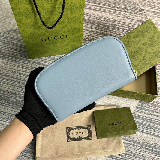 Luxury Gucci GG BLONDIE 21 FULL ZIP WALLET IN BLUE PASTEL CALFSKIN