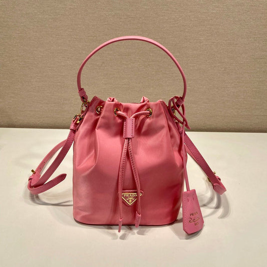 Luxury PradaBUCKET BAG 19 IN CANDY PINK RE-NYLON AND SAFFIANO LEATHER HANDLE