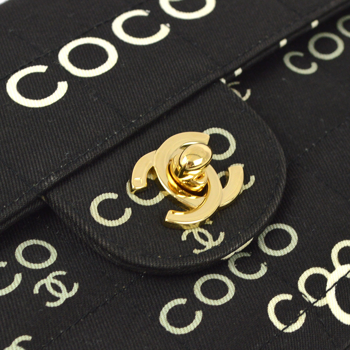 Luxury Chanel 2000-2001 Black Canvas COCO East West Choco Bar Shoulder Bag