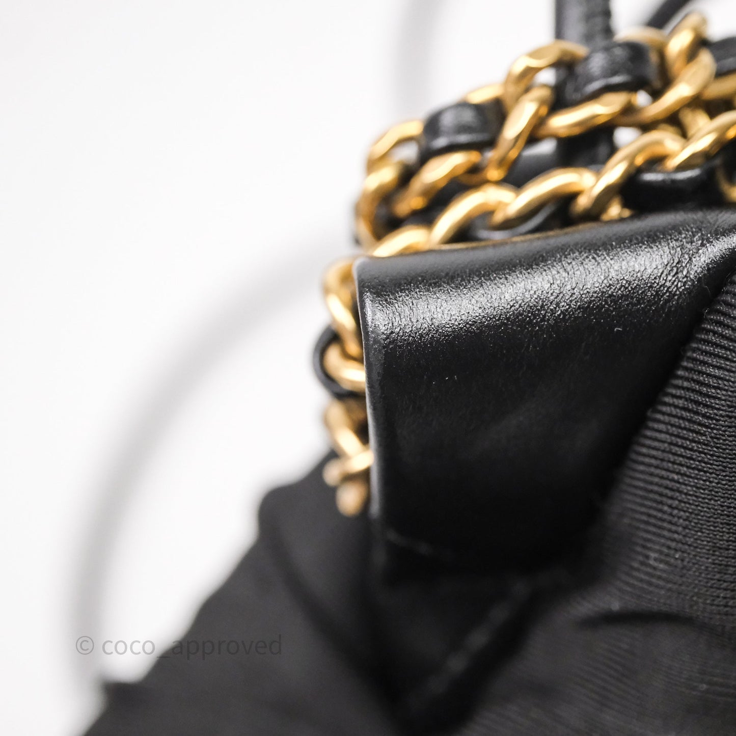 Chanel 22 Mini Bag Black Crumpled Calfskin White Lacquered Metal Logo