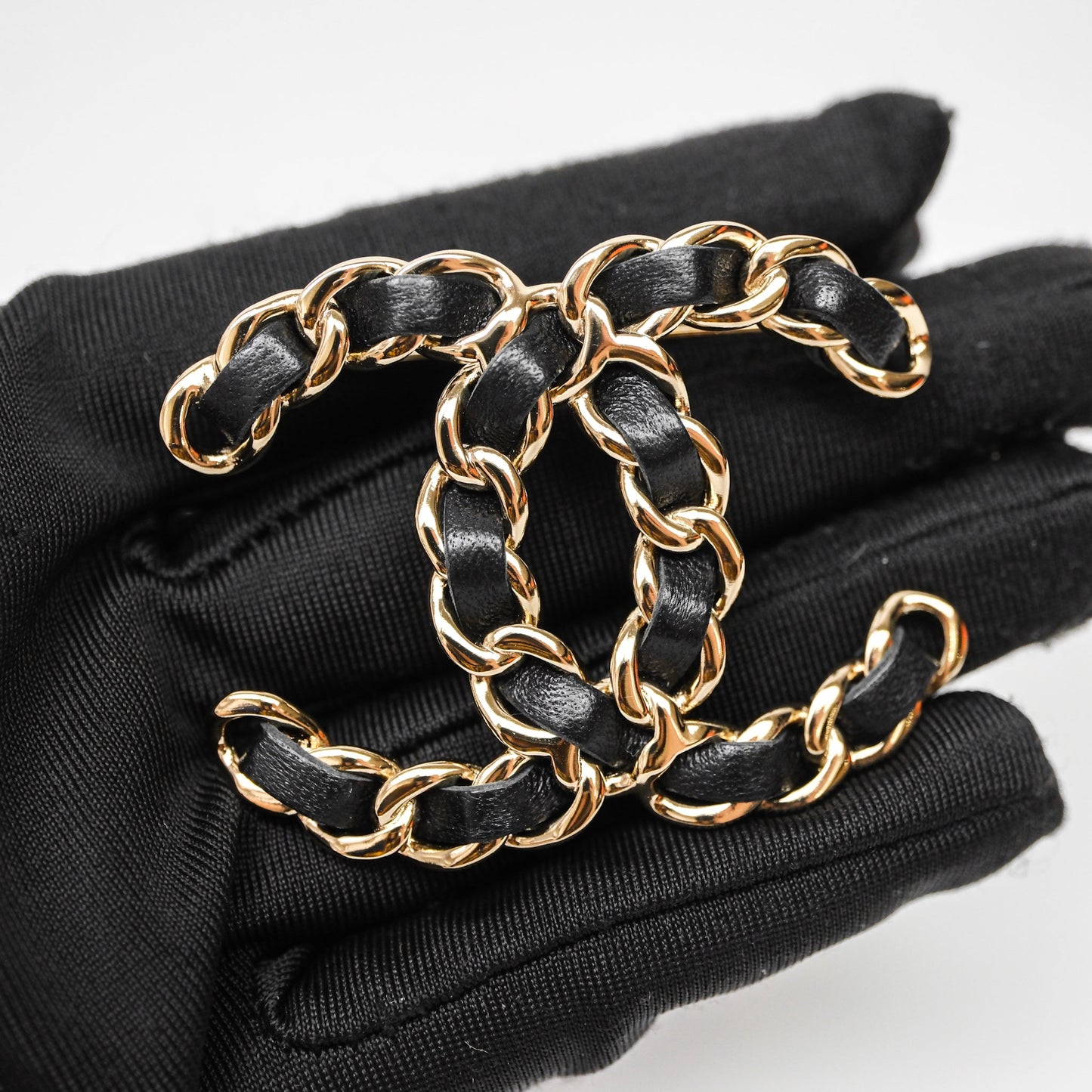 Chanel CC Braided Black Leather Brooch Gold Tone 22V