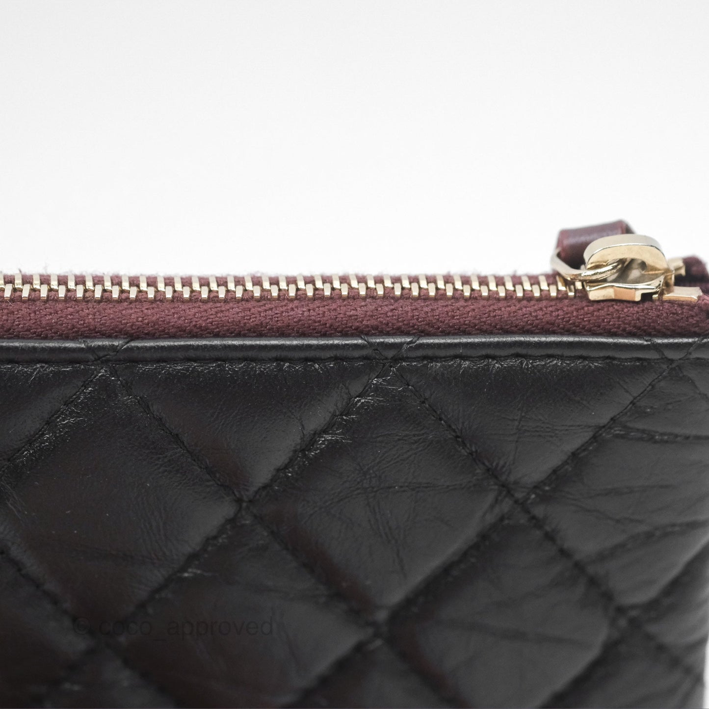 Chanel Quilted Mini Reissue O Case Black Calfskin Aged Gold Hardware