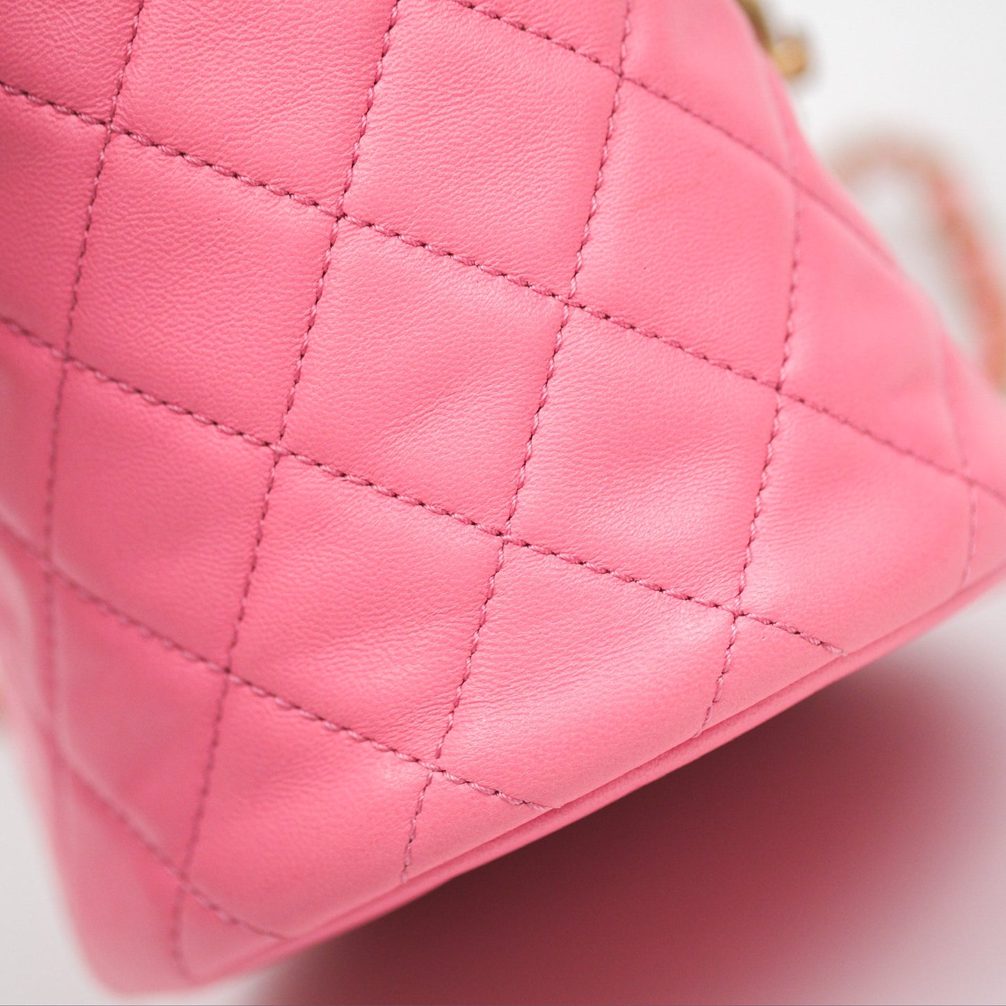 Chanel Pearl Crush Drawstring Bucket Bag Pink Lambskin Aged Gold Hardware