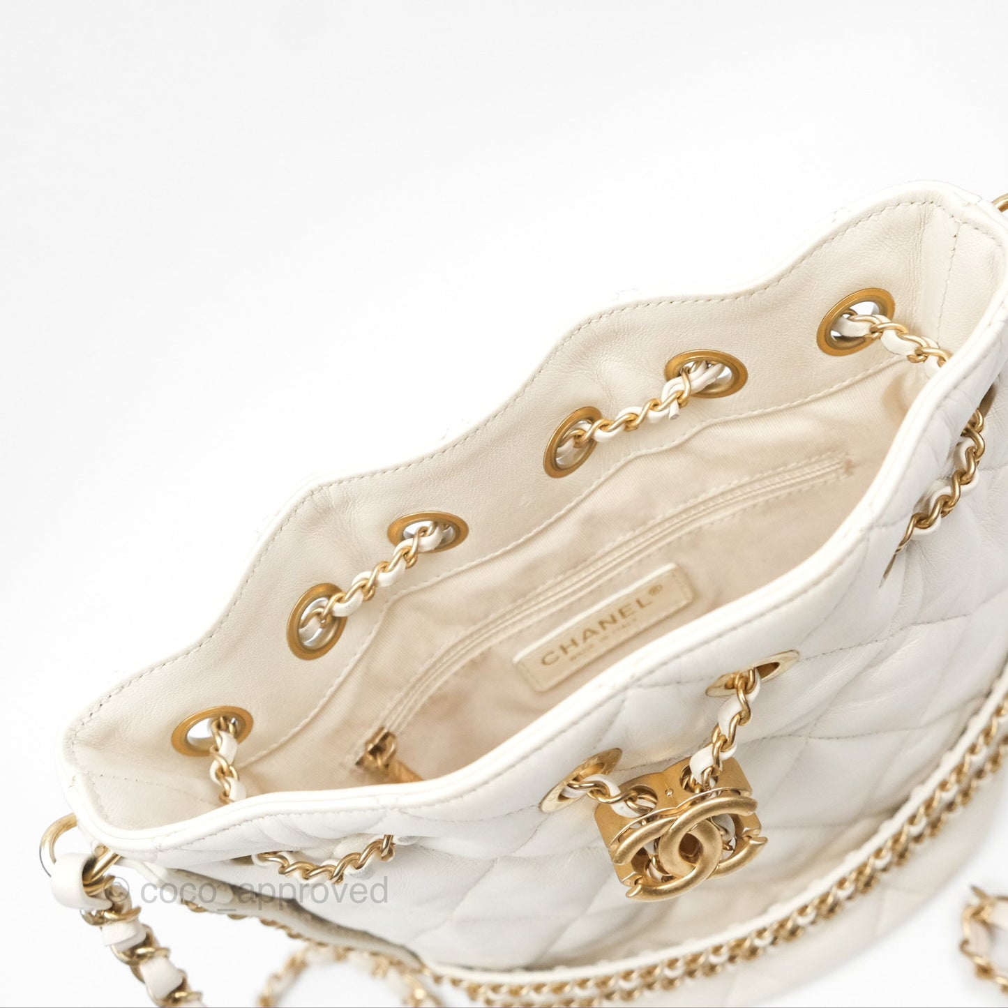 Chanel Quilted Drawstring Bucket Bag Ivory Lambskin Aged Gold Hardware