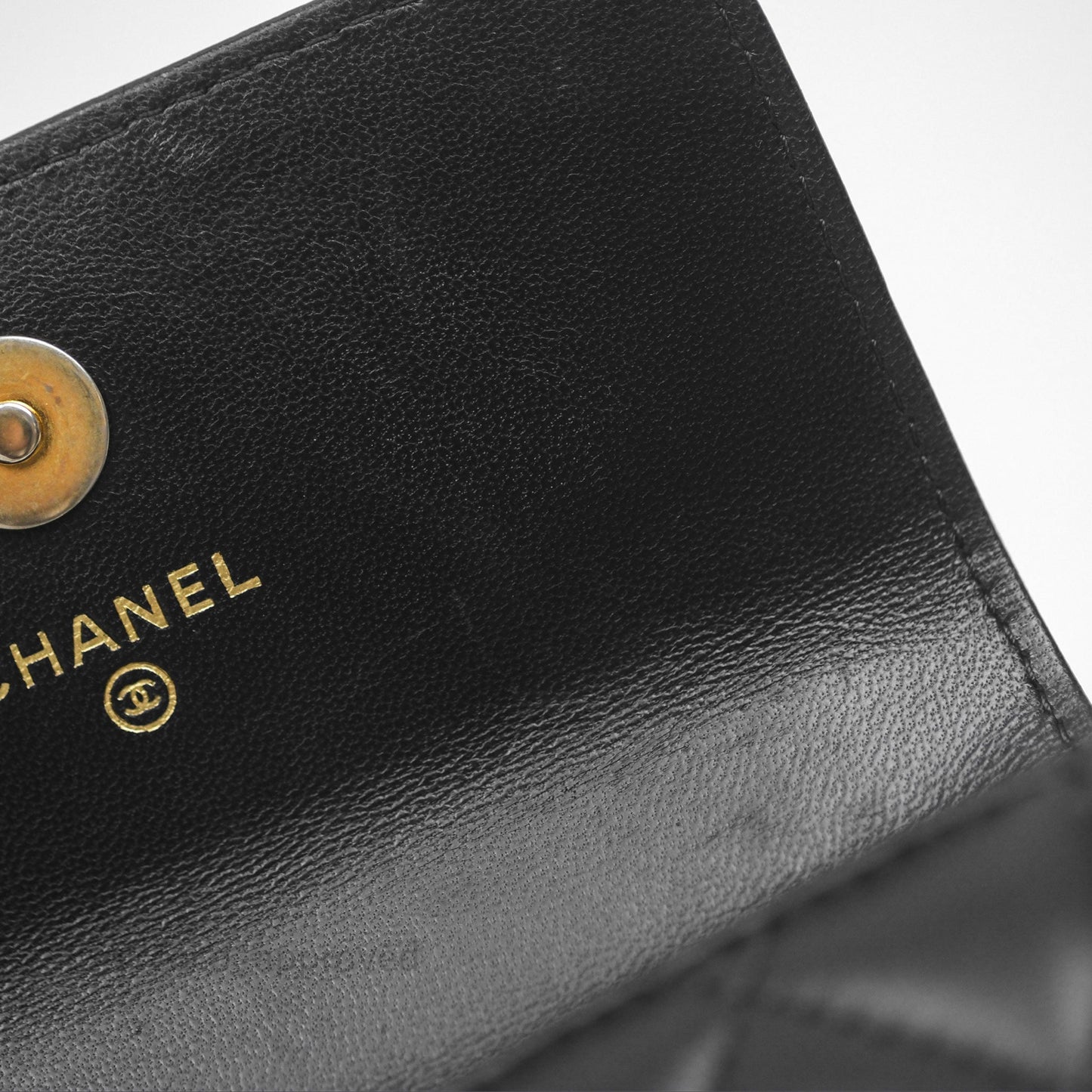 Chanel Mini Clutch With Chain Camellia Adjustable Black Lambskin Aged Gold Hardware