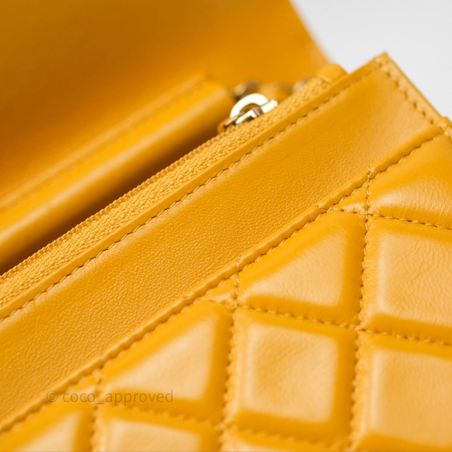 Chanel Quilted Classic Chain Around WOC Yellow Lambskin Aged Gold Hardware