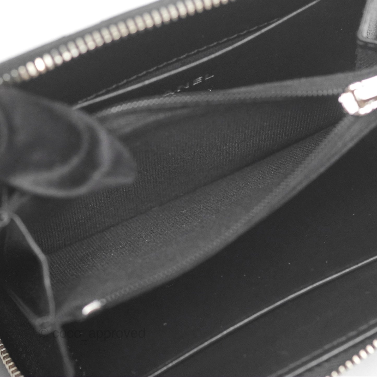 Chanel Zipped Coin Purse Black Caviar White CC Silver Hardware