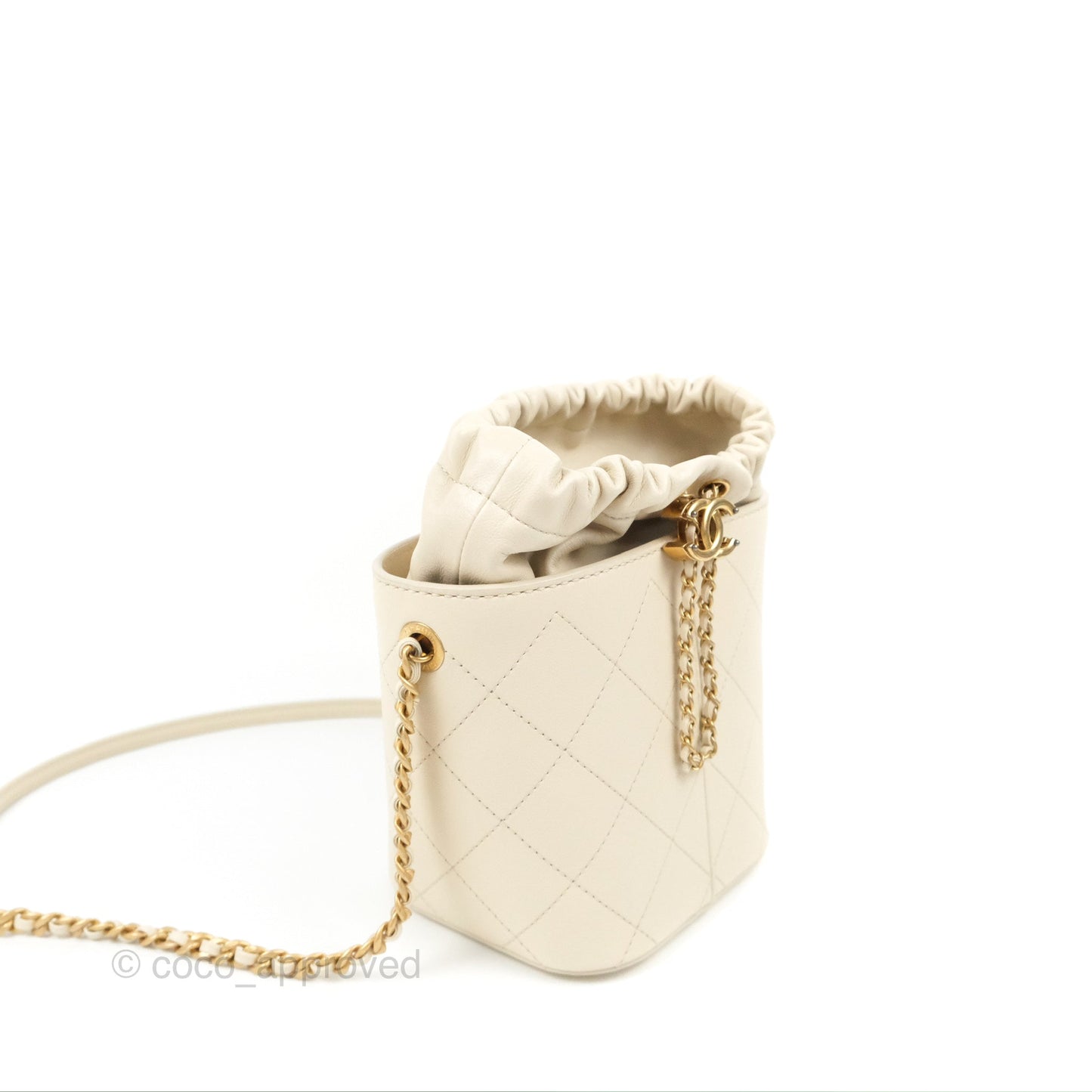 Chanel Quilted Drawstring Bucket Bag Ivory Lambskin Aged Gold Hardware 19C