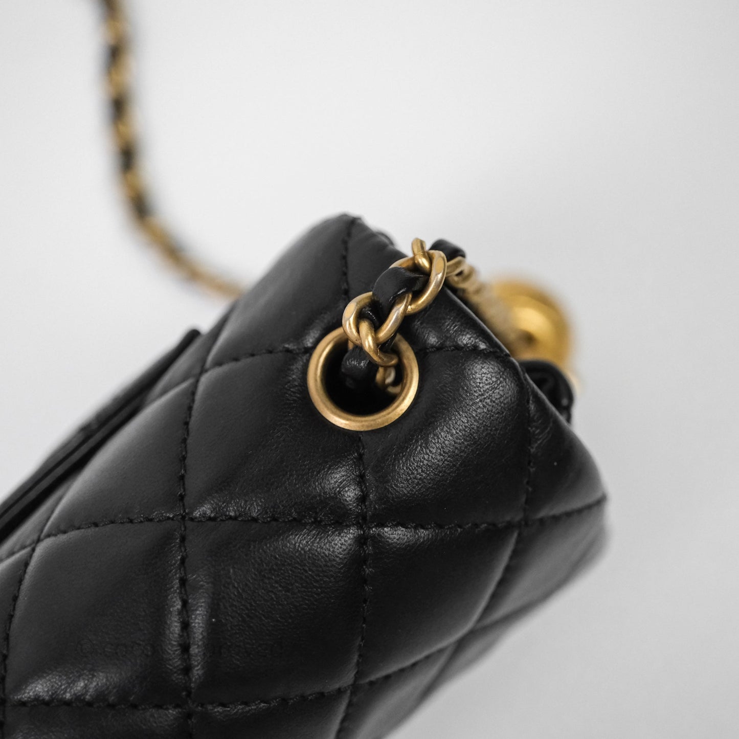 Chanel Mini Rectangular Pearl Crush Quilted Black Lambskin Aged Gold Hardware
